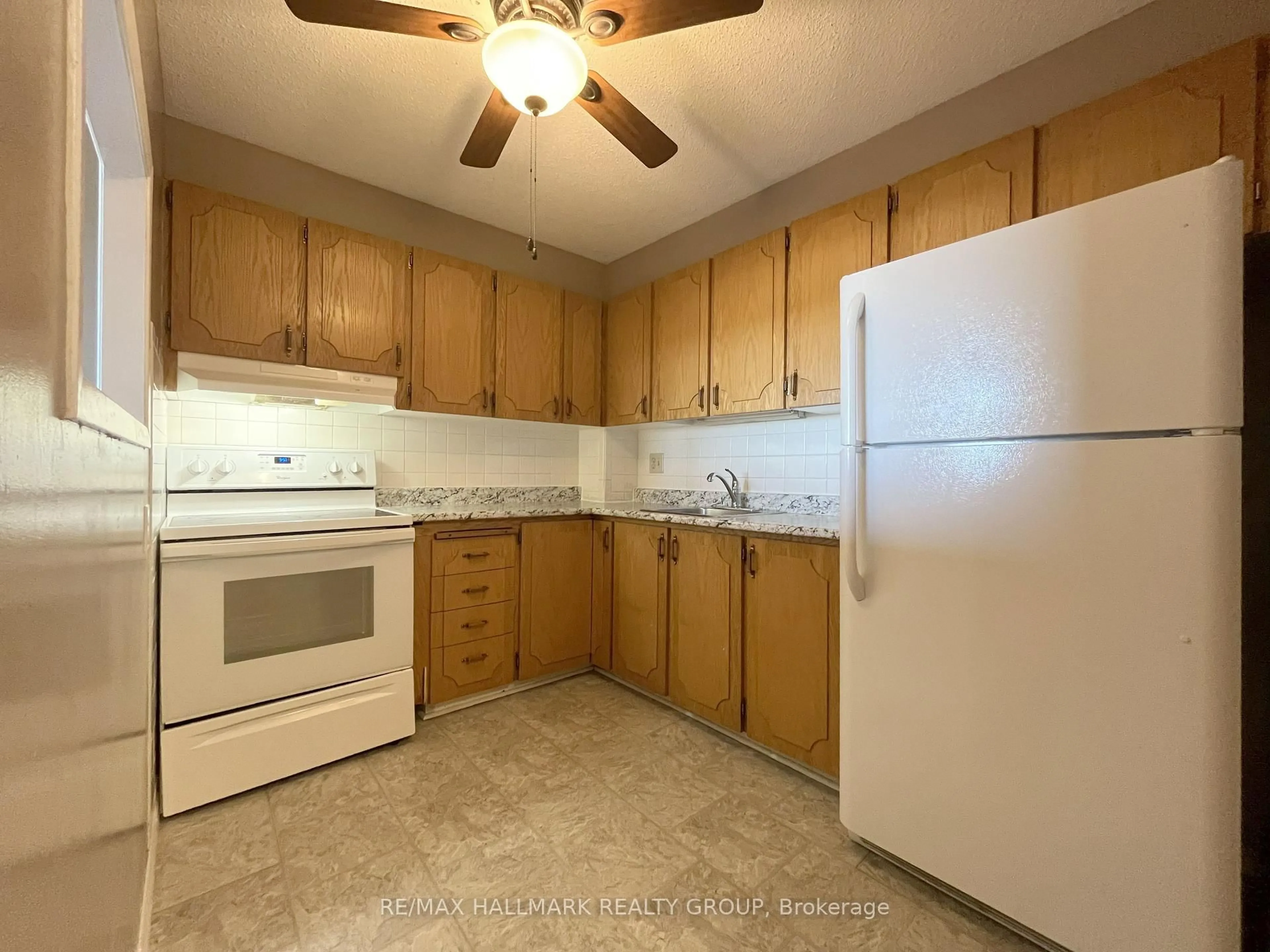 Standard kitchen, ceramic/tile floor for 20 Chesterton Dr #1015, Ottawa Ontario K2E 6Z7