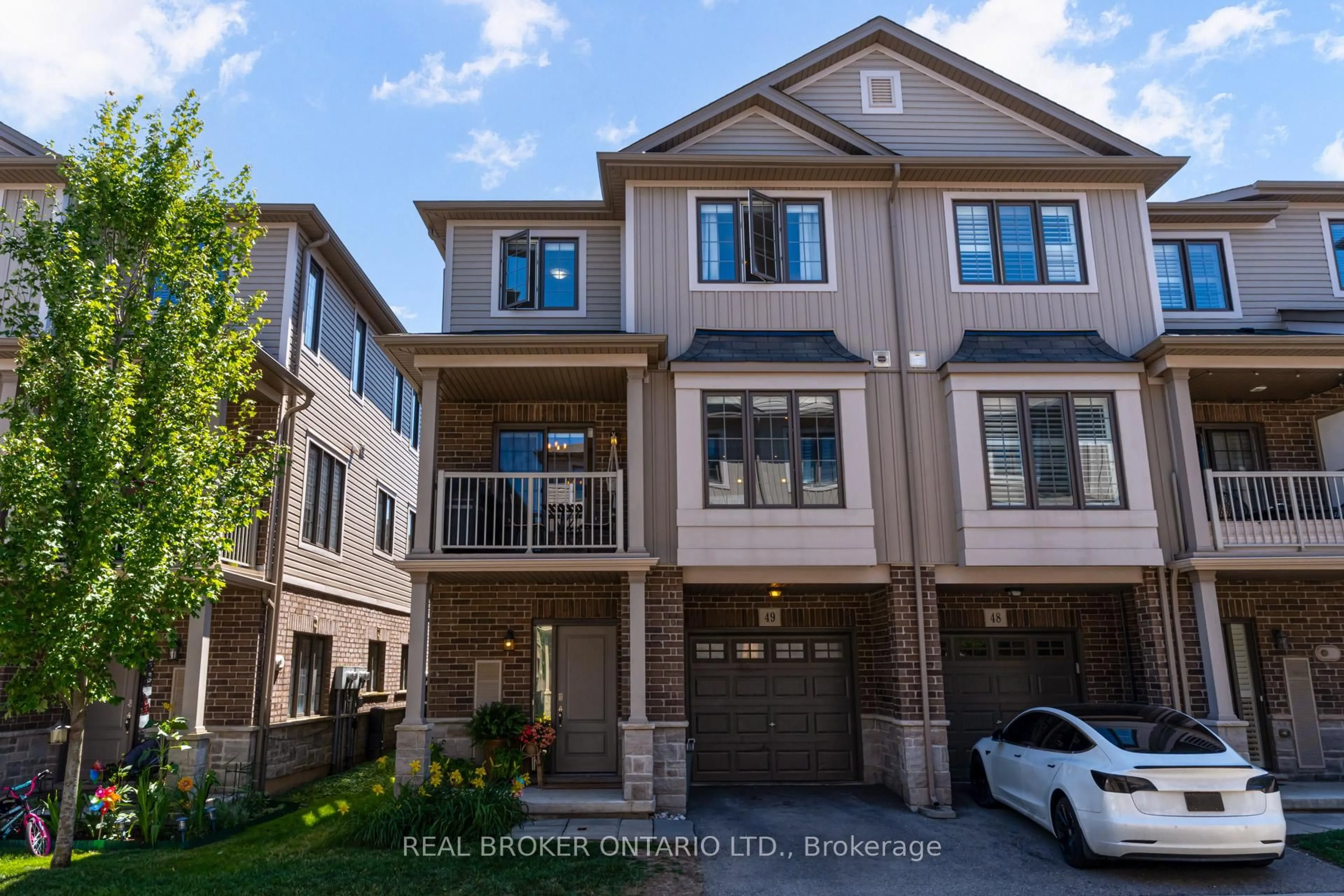 Home with brick exterior material, street for 377 Glancaster Rd #49, Hamilton Ontario L9G 0G4