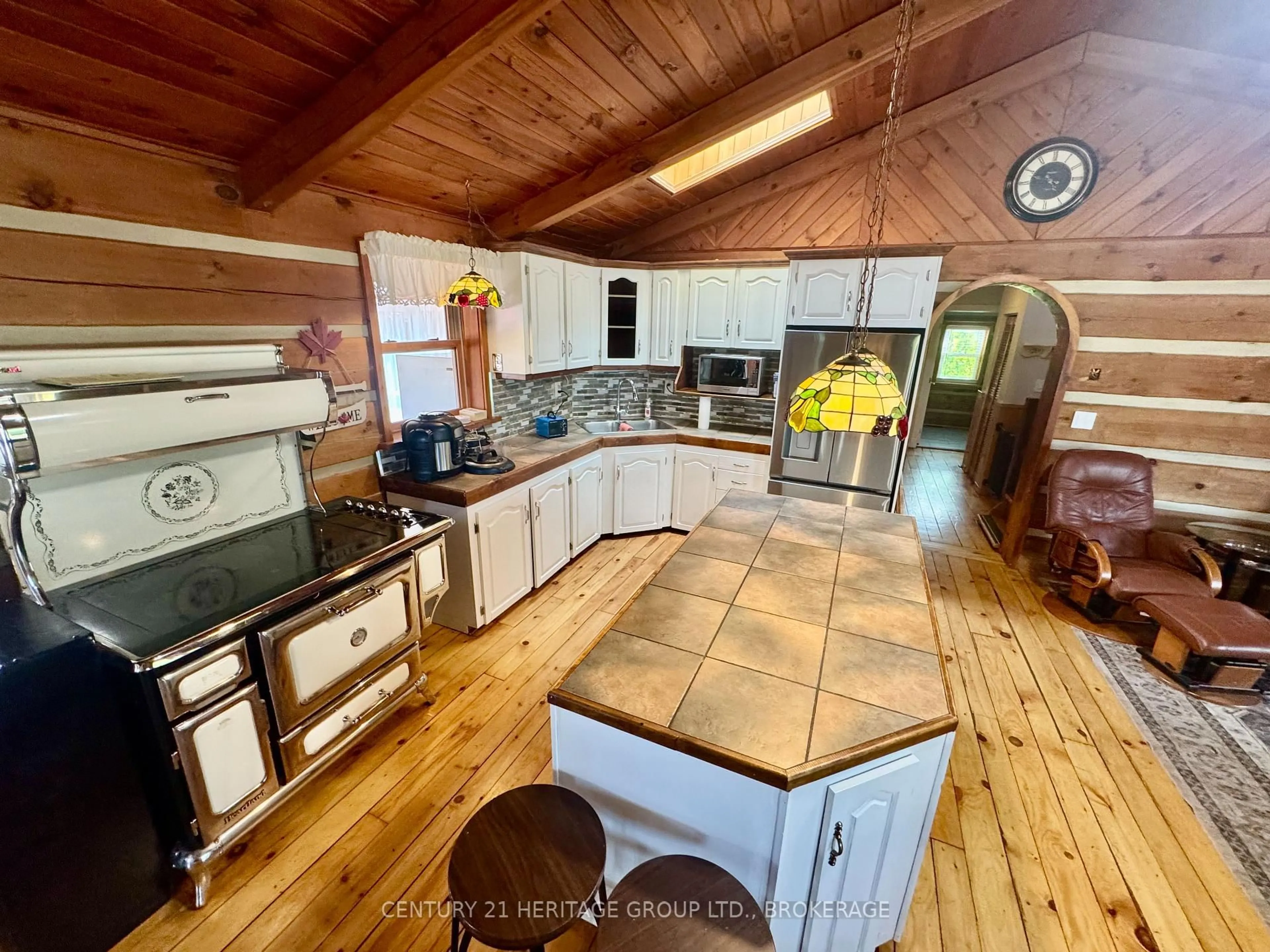 Open concept kitchen, wood/laminate floor for 126 Varty Lake Rd, Yarker Ontario K0K 3N0
