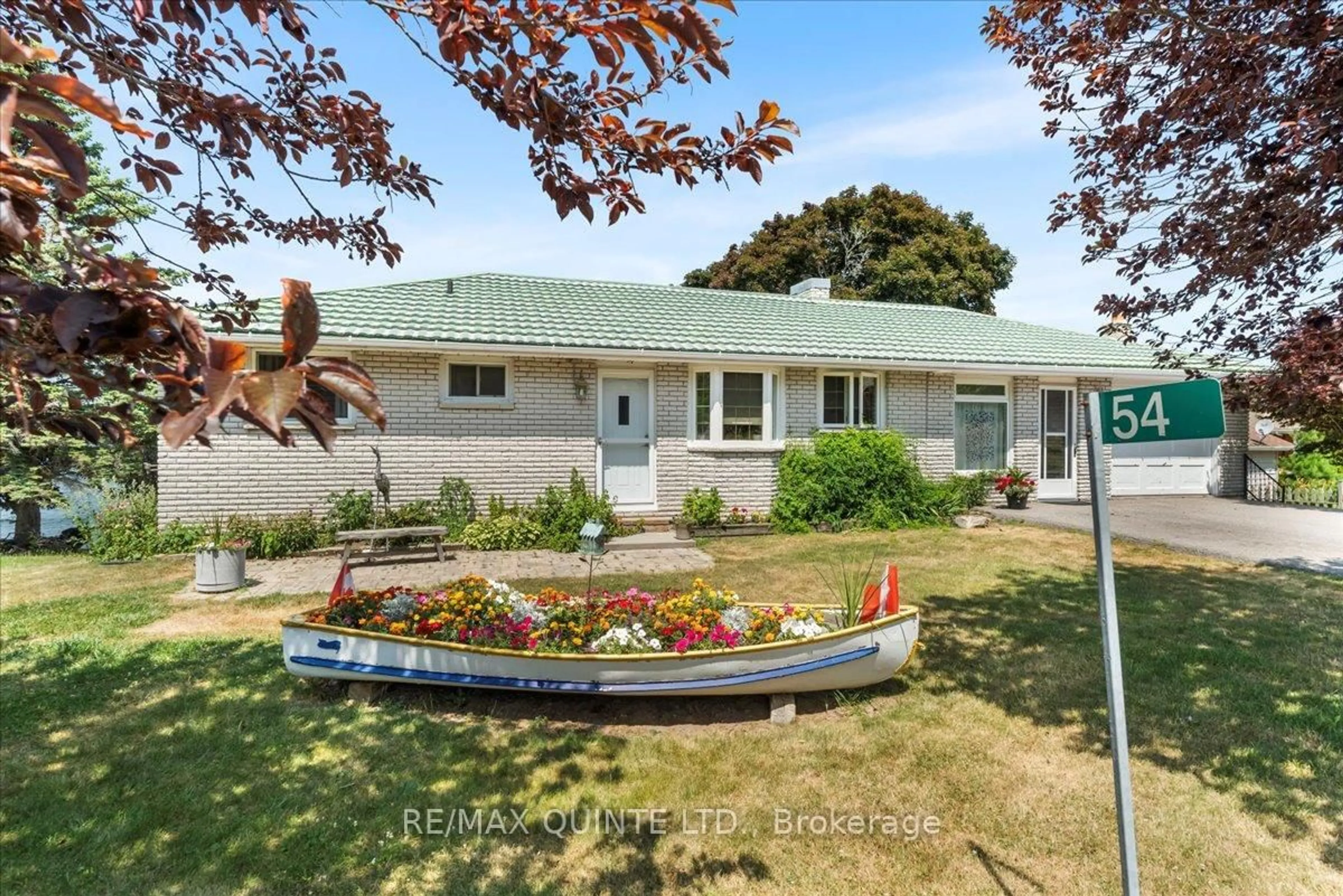 A pic from outside/outdoor area/front of a property/back of a property/a pic from drone, street for 54 Cedar Lane, Prince Edward County Ontario K0K 2T0