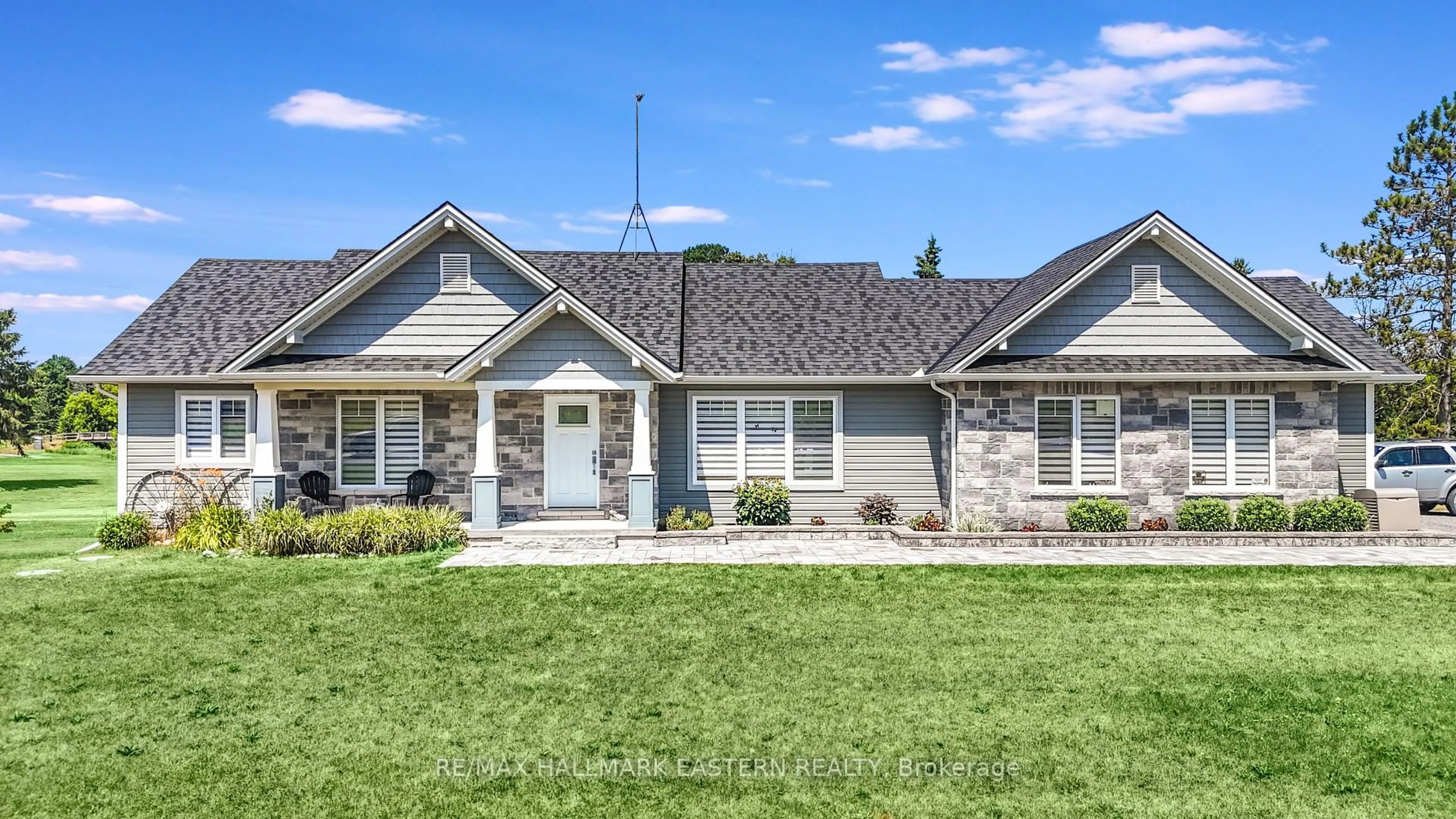 Home with vinyl exterior material, street for 1557 Frankfordstirling Rd, Stirling Ontario K0K 3E0