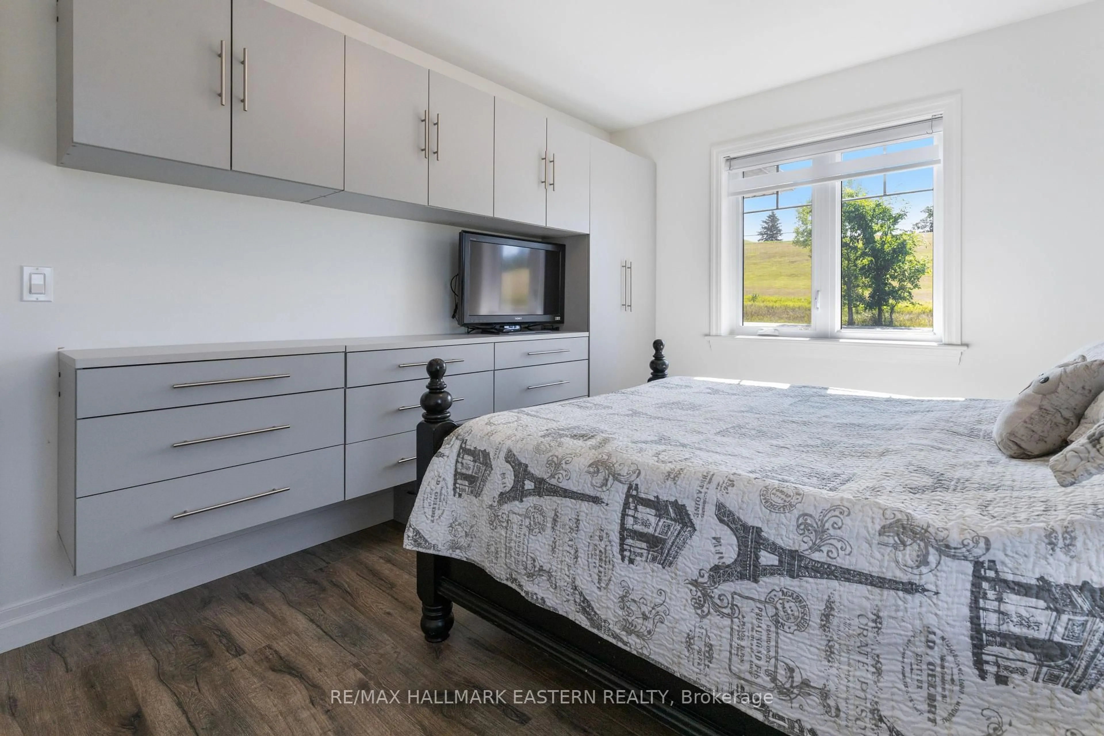 Bedroom with bed, wood/laminate floor for 1557 Frankford -Stirling Rd, Stirling Ontario K0K 3E0