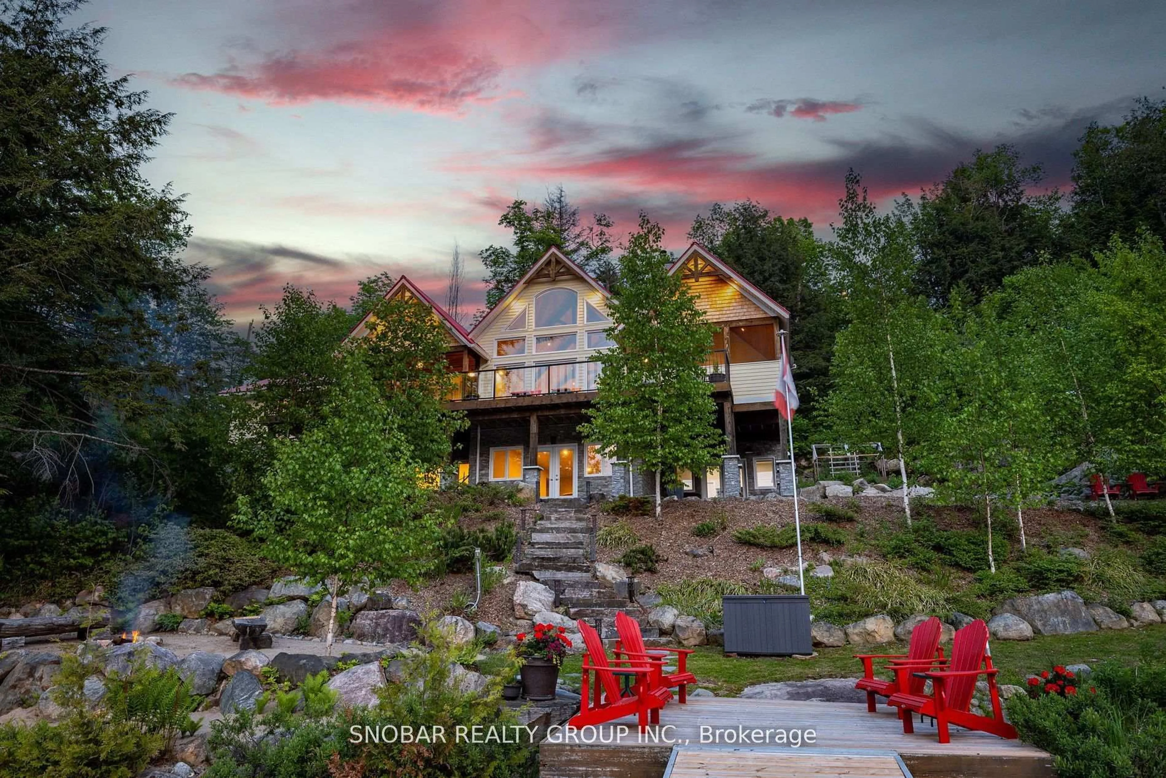 A pic from outside/outdoor area/front of a property/back of a property/a pic from drone, mountain view for 1523 Fish Hatchery Rd #25, Muskoka Lakes Ontario P0B 1M0
