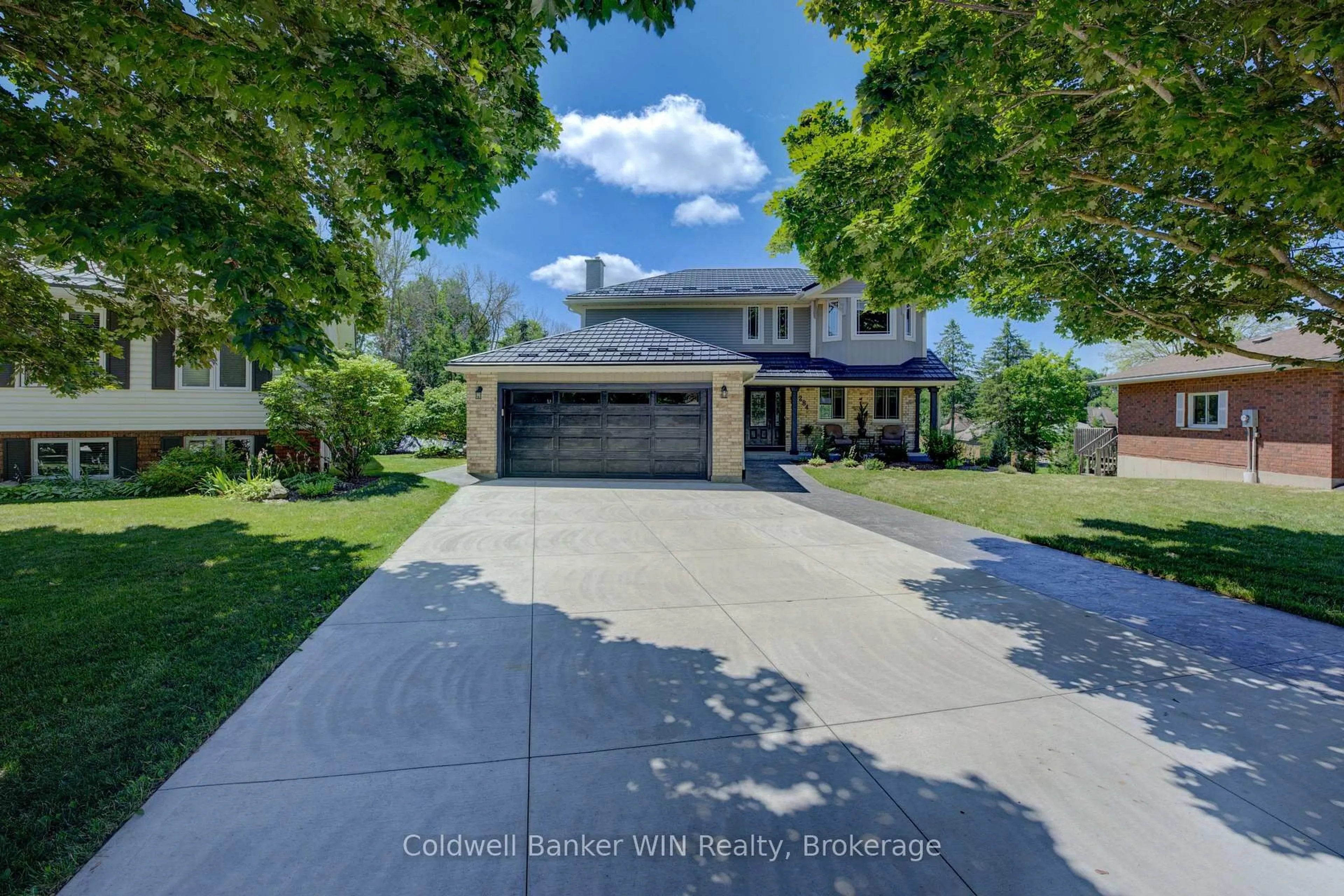 A pic from outside/outdoor area/front of a property/back of a property/a pic from drone, street for 284 FOREST GLEN Dr, Wellington North Ontario N0G 2L2