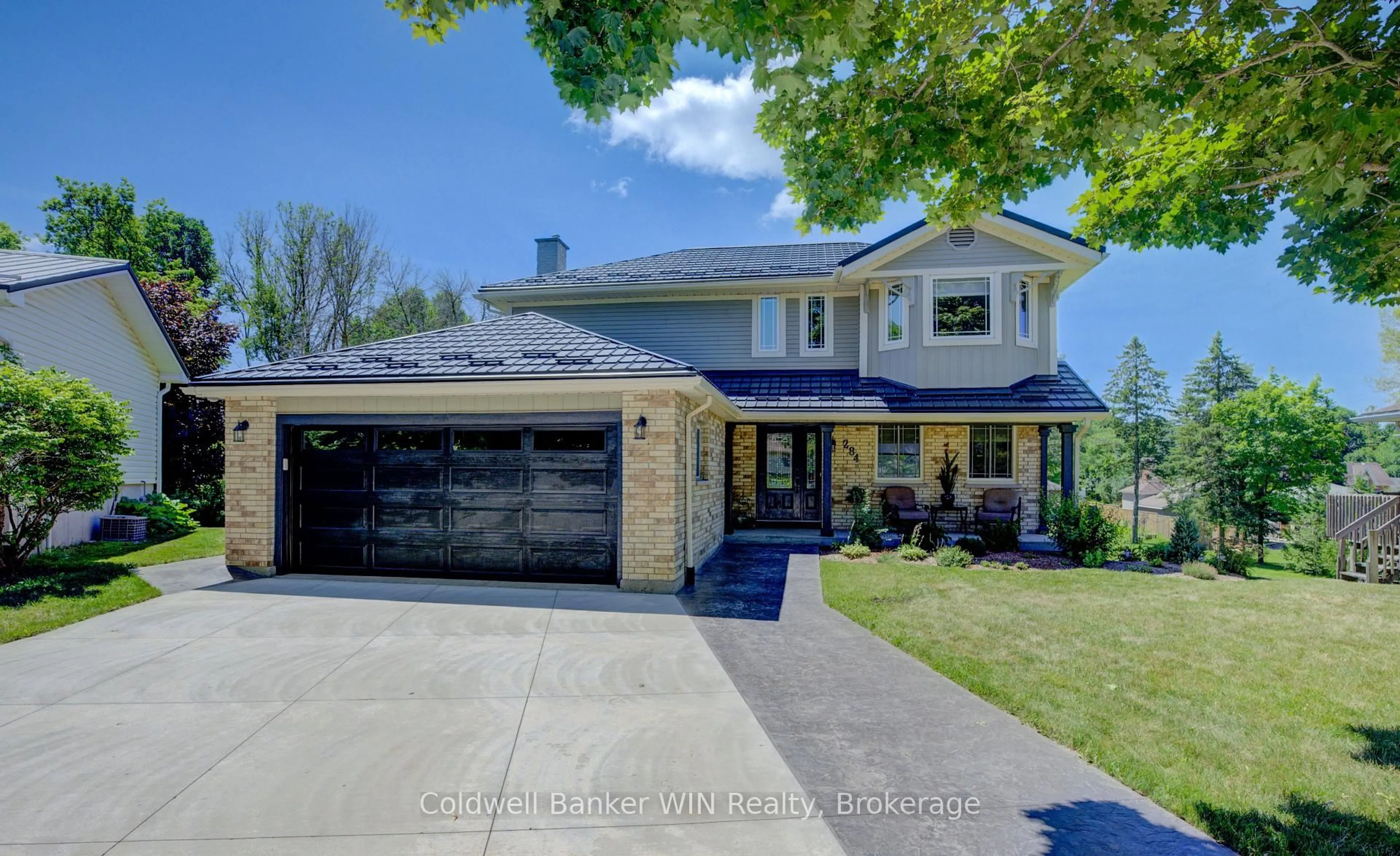 Home with brick exterior material, street for 284 FOREST GLEN Dr, Wellington North Ontario N0G 2L2