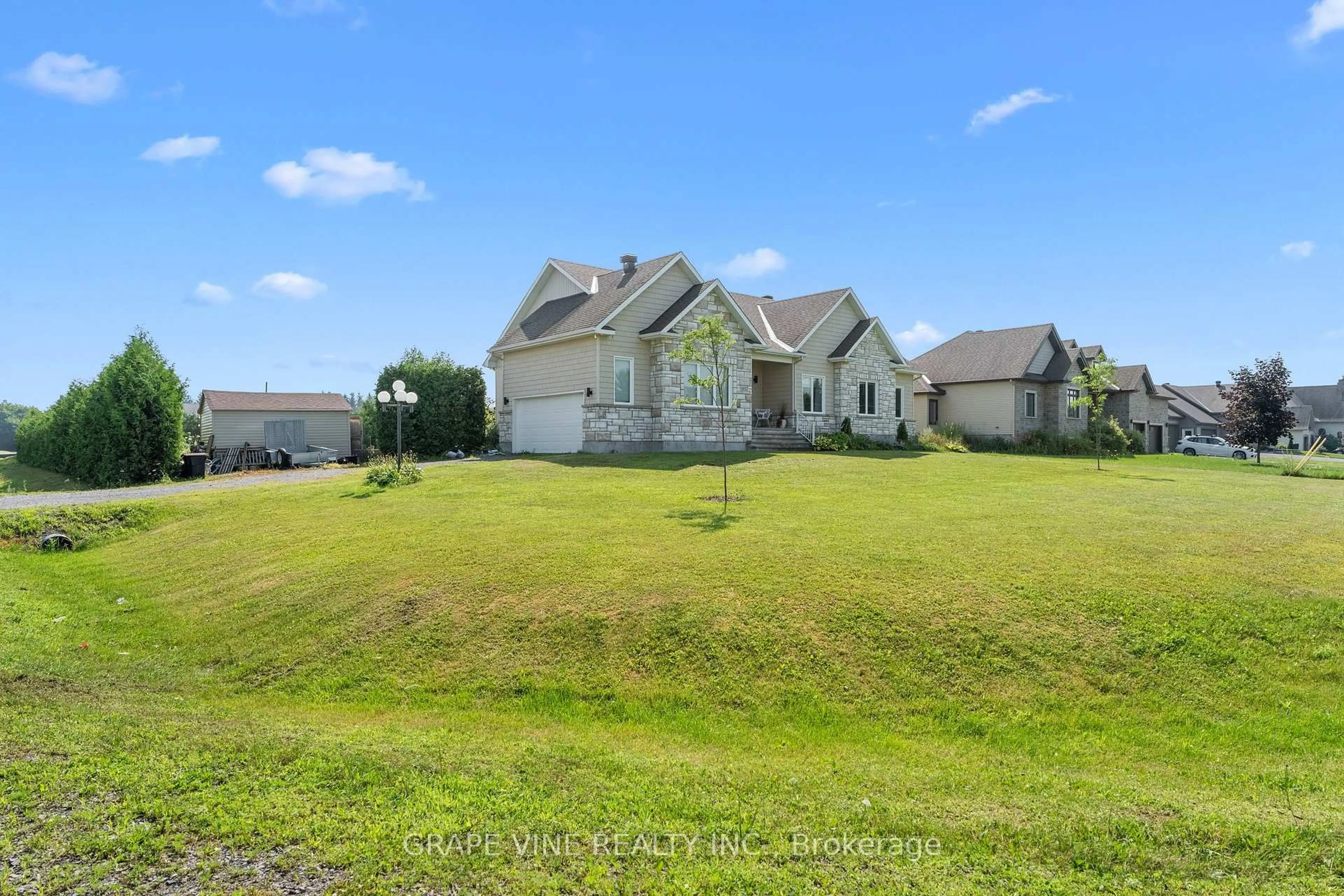A pic from outside/outdoor area/front of a property/back of a property/a pic from drone, water/lake/river/ocean view for 5607 Maklynne Way, Vars Ontario K0A 3H0
