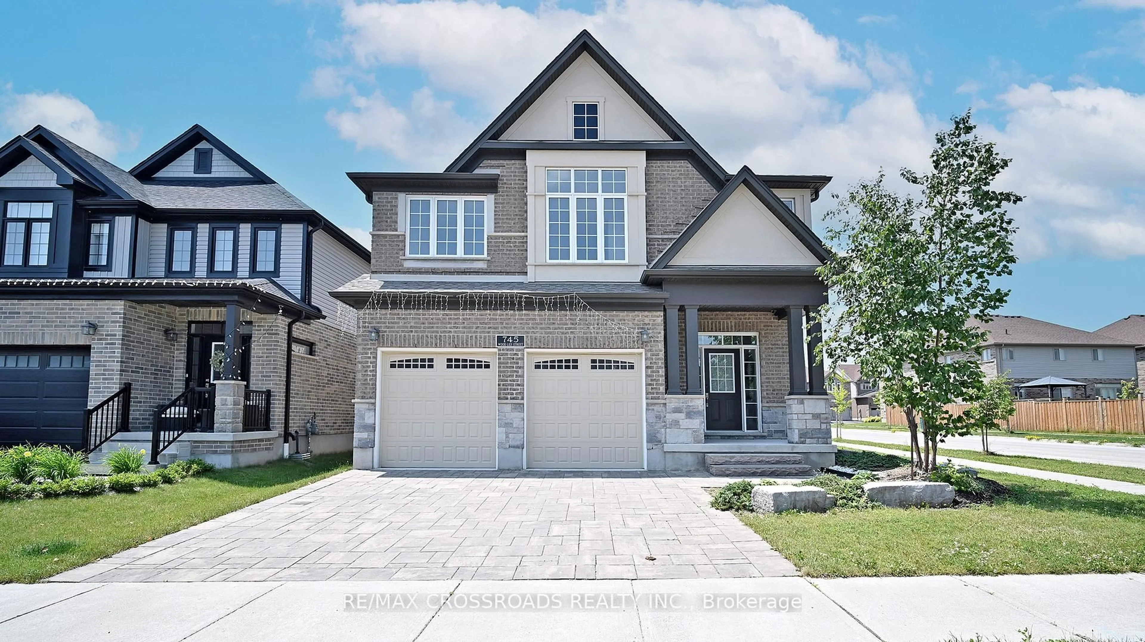 Home with brick exterior material, street for 745 Wood Lily St, Waterloo Ontario N2V 0C3