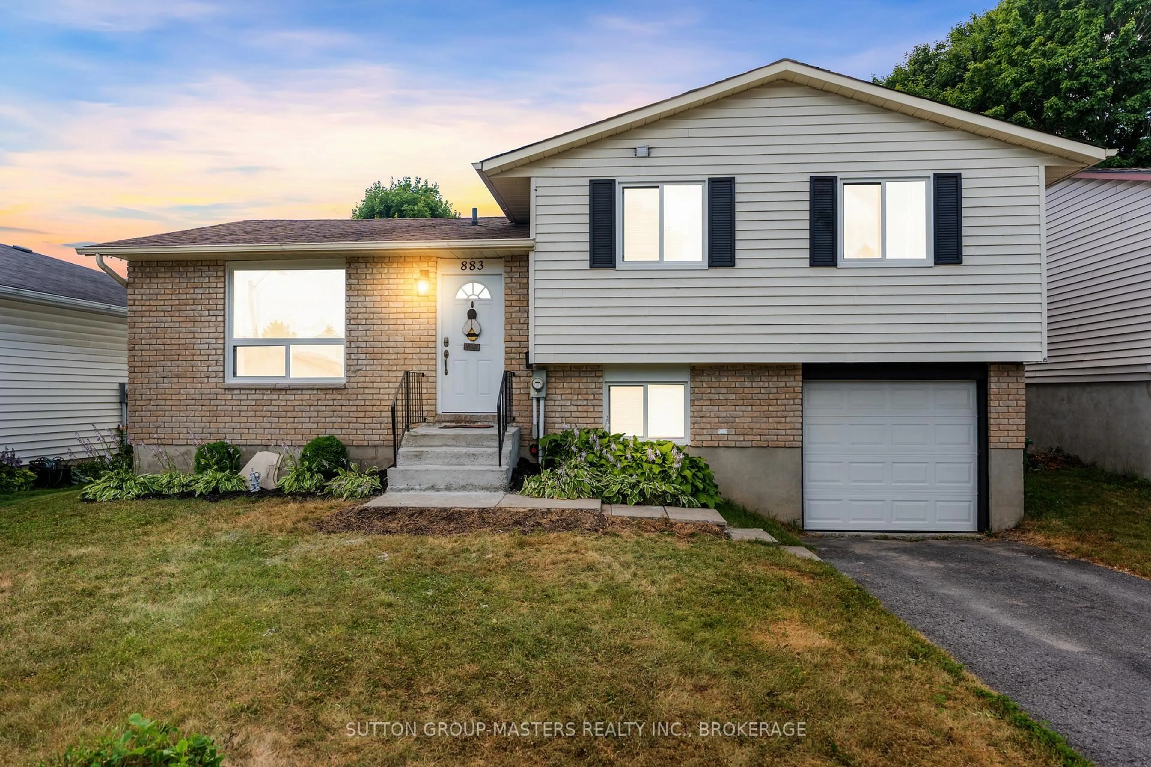 Home with vinyl exterior material, street for 883 Old Colony Rd, Kingston Ontario K7P 1S1