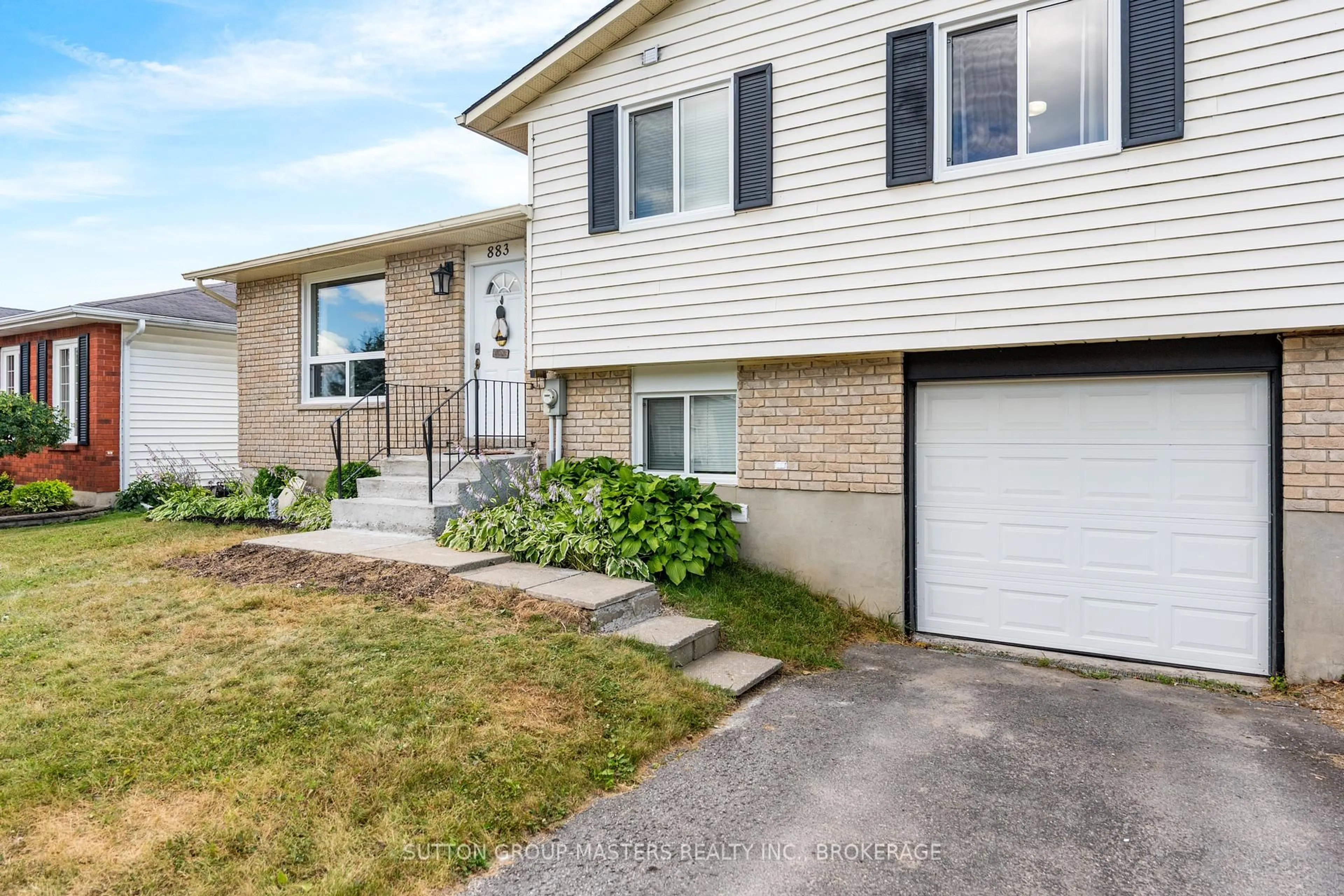 Home with vinyl exterior material, street for 883 Old Colony Rd, Kingston Ontario K7P 1S1