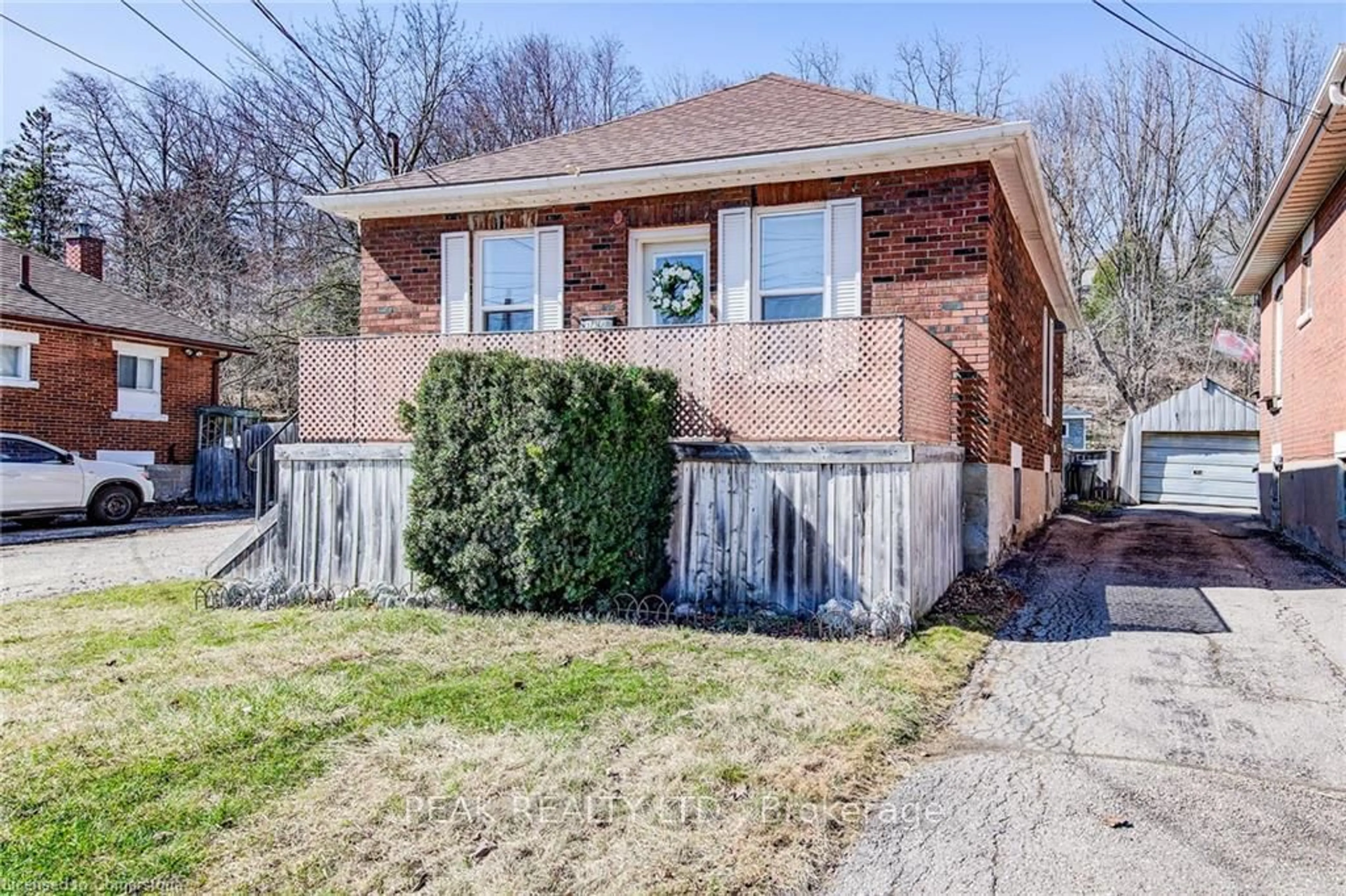 Home with brick exterior material, street for 124 Elizabeth St, Guelph Ontario N1E 2X3