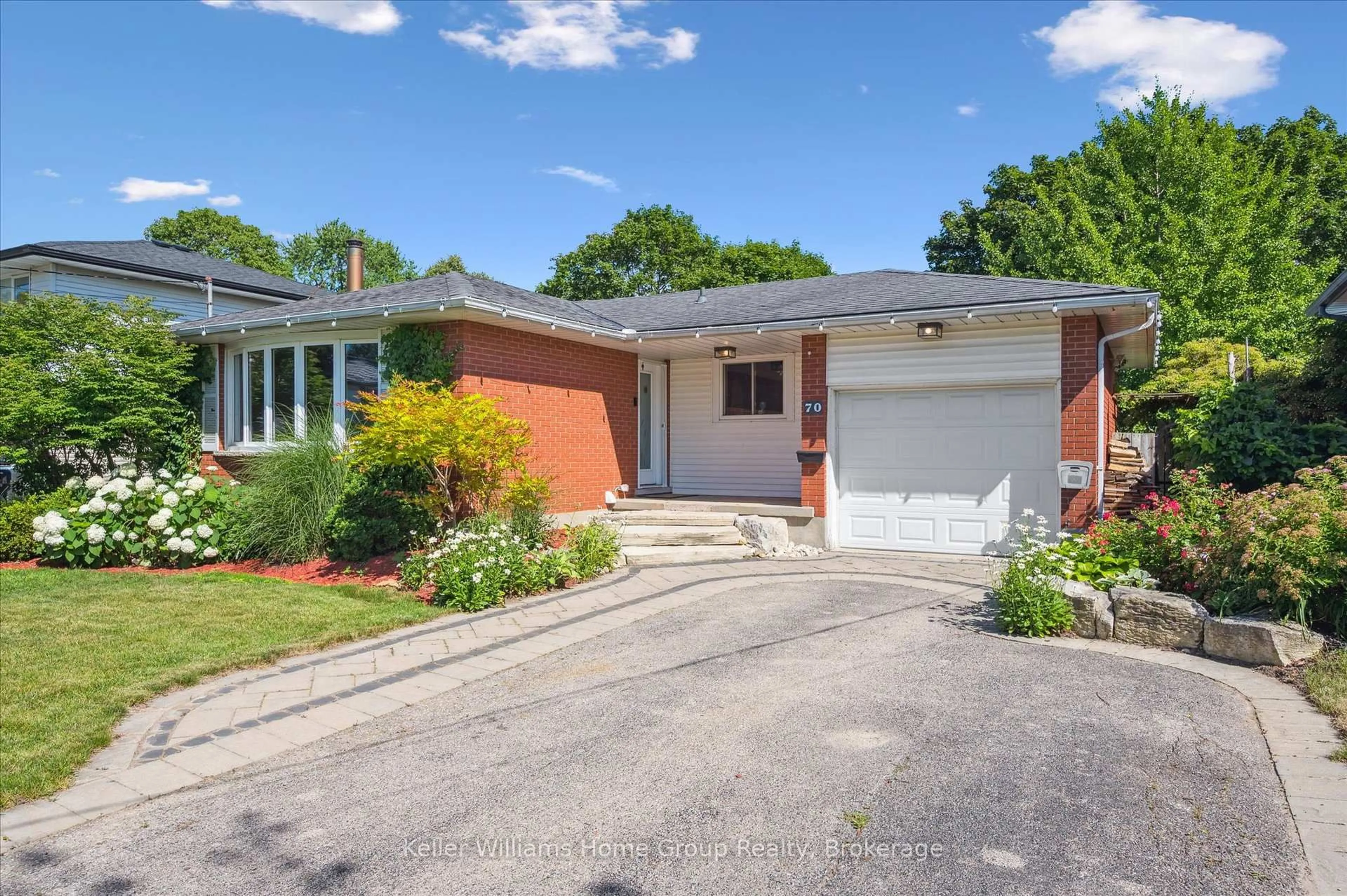 Home with brick exterior material, street for 70 Balmoral Dr, Guelph Ontario N1E 3N6