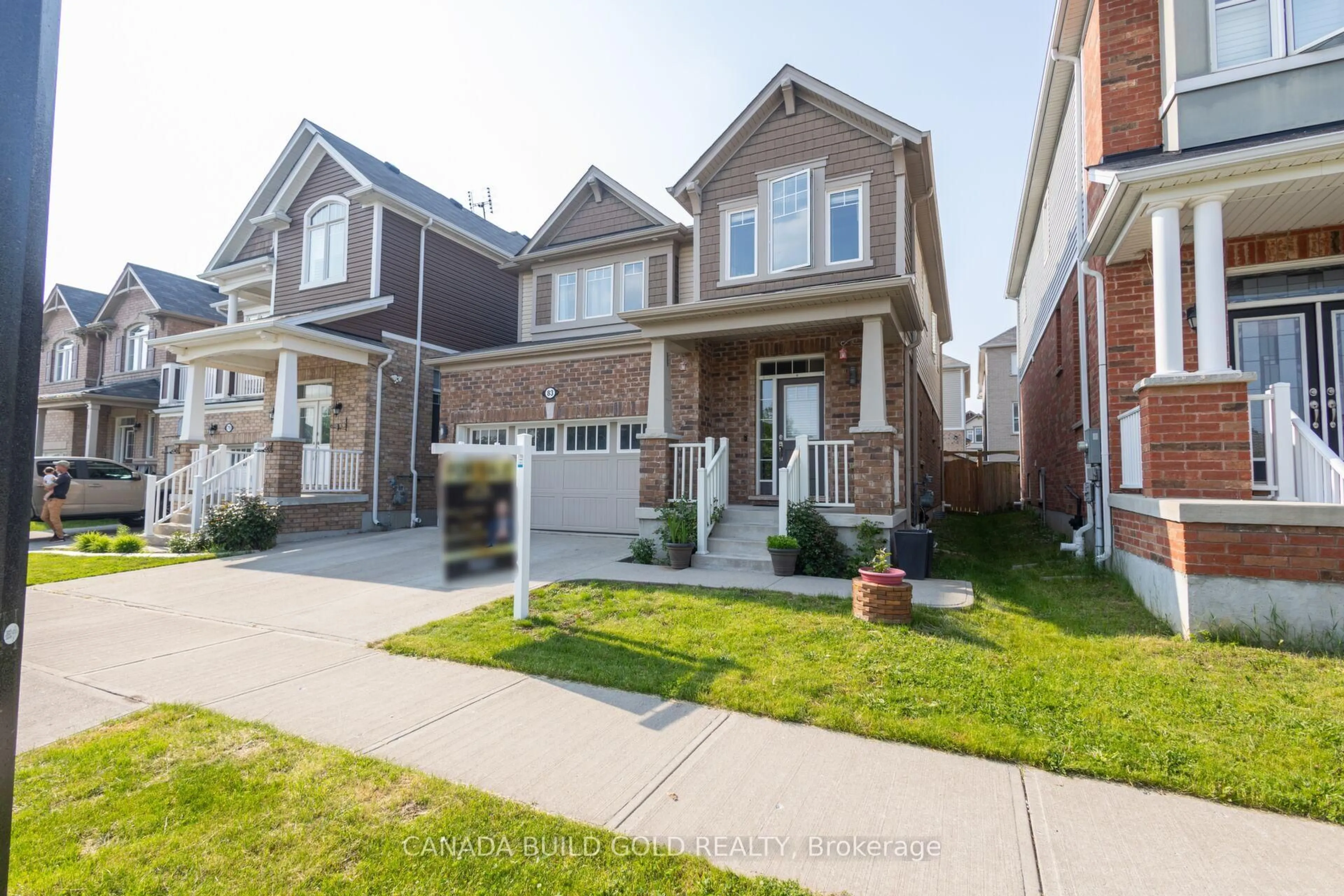 Home with brick exterior material, street for 83 West Oak Tr, Kitchener Ontario N2R 0K7