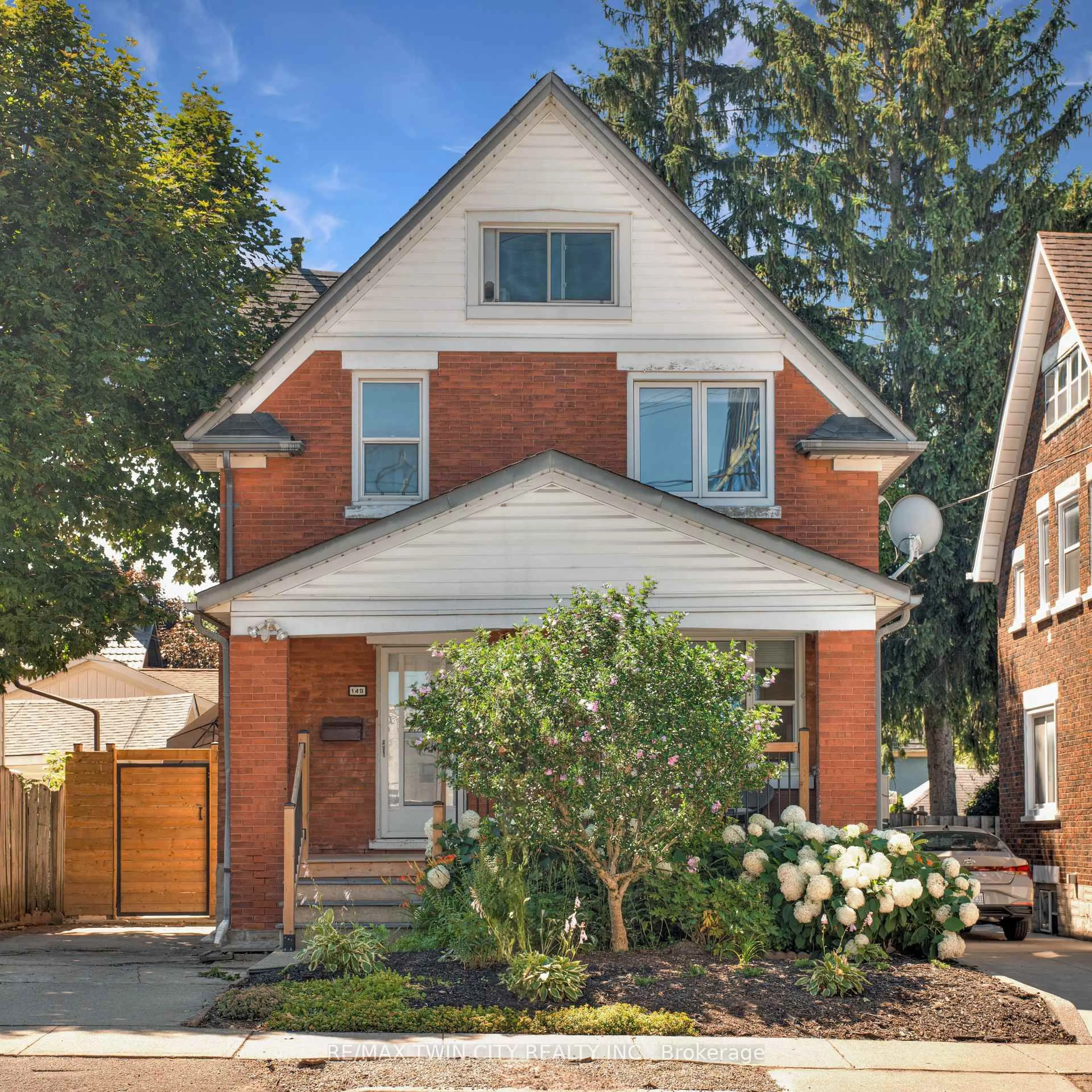 Home with brick exterior material, street for 149 Shanley St, Kitchener Ontario N2H 5P4