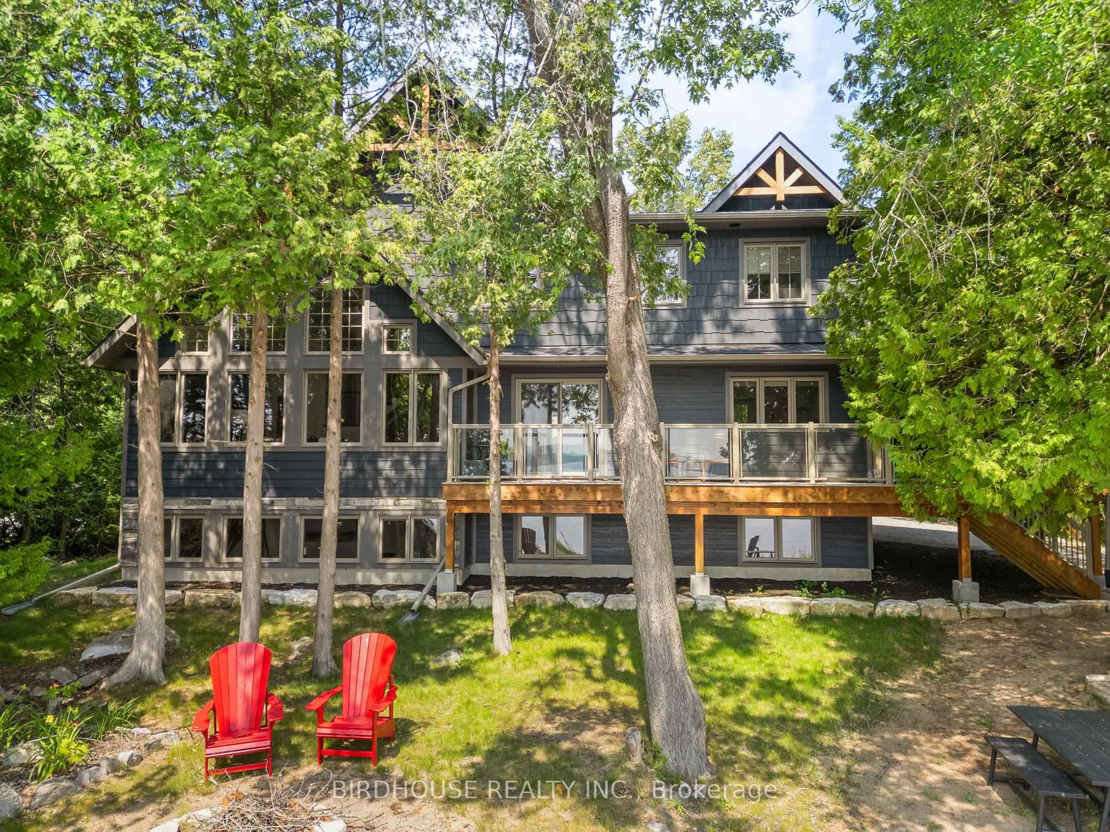 A pic from outside/outdoor area/front of a property/back of a property/a pic from drone, unknown for 4 Moose Rd, Kawartha Lakes Ontario K0M 1K0