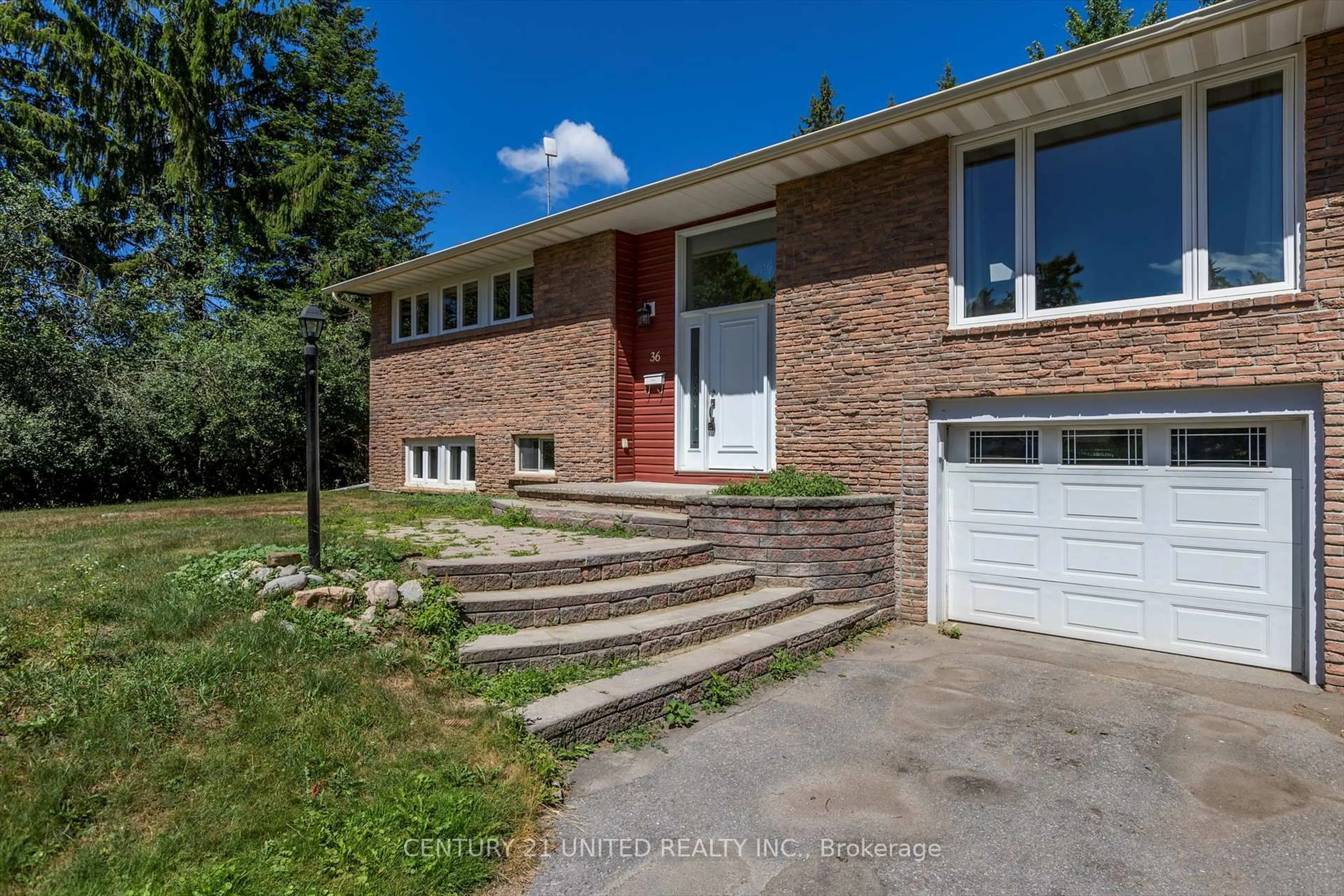 Home with brick exterior material, street for 36 Emily Manor Dr, Kawartha Lakes Ontario K0L 2W0