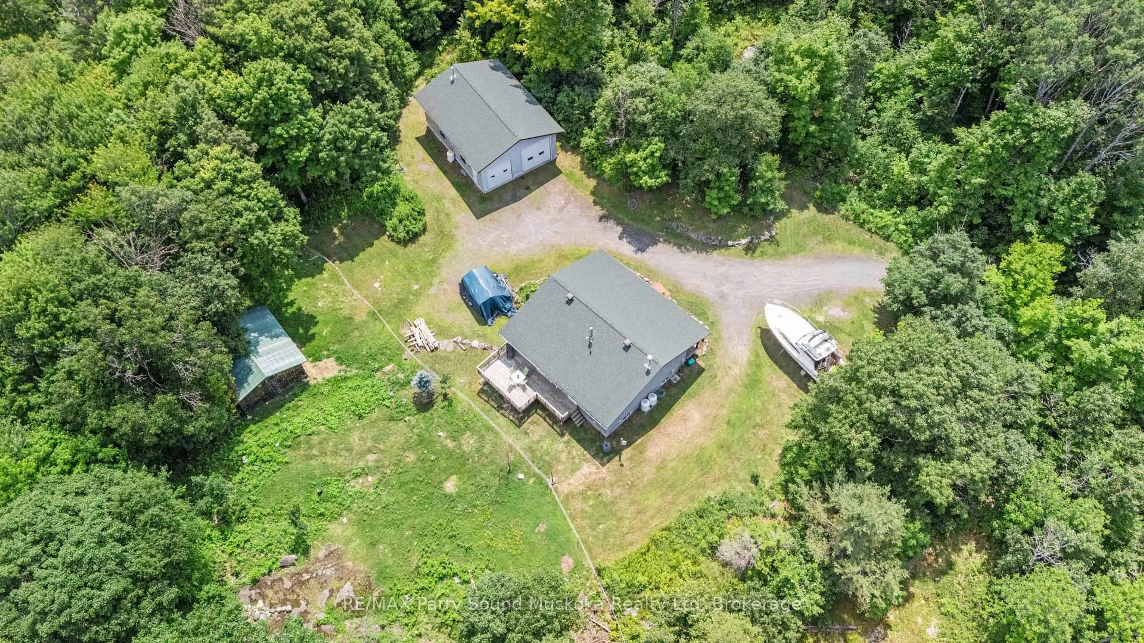 A pic from outside/outdoor area/front of a property/back of a property/a pic from drone, unknown for 88 Black Rd, Seguin Ontario P2A 0B2