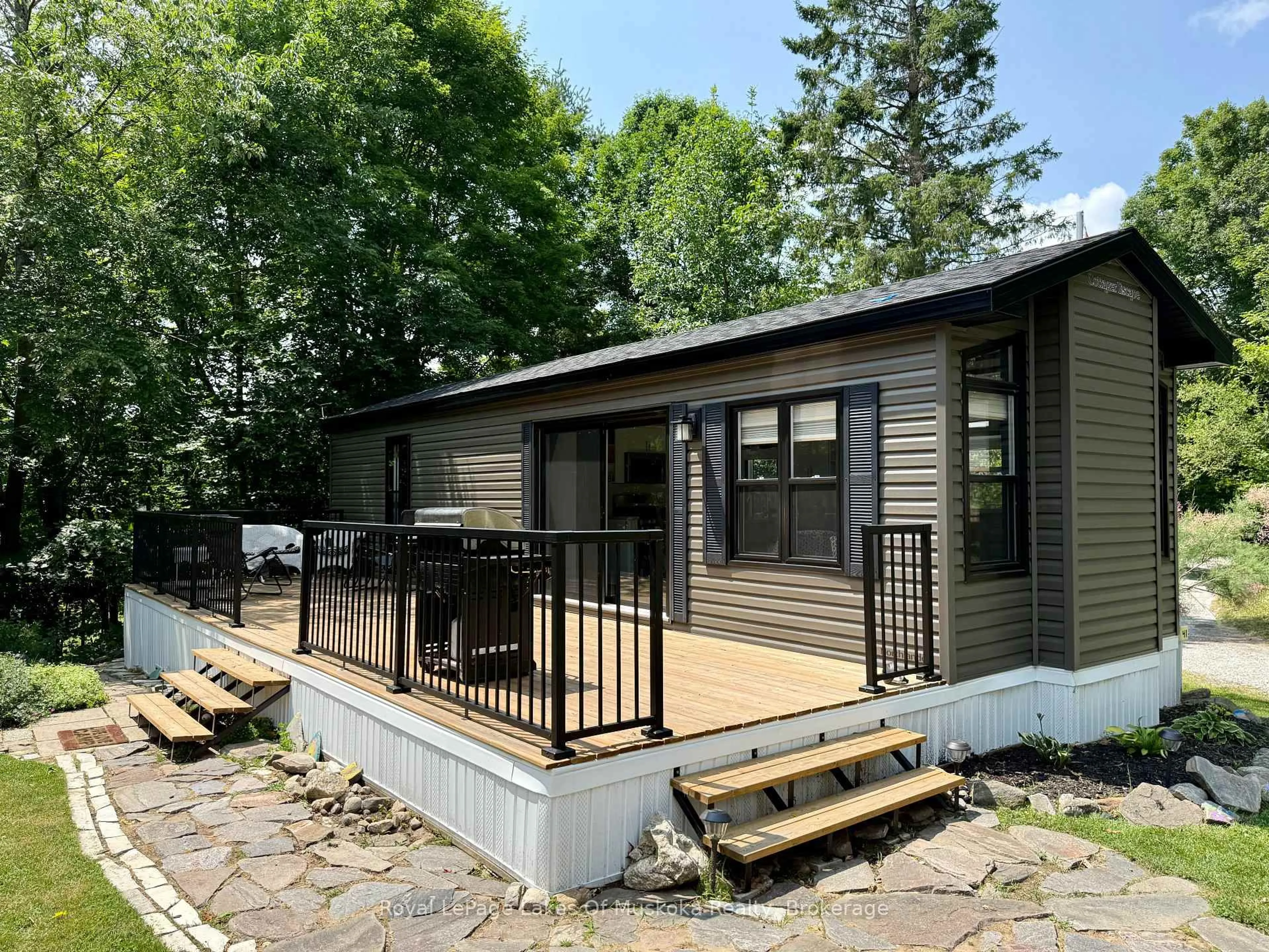 Home with vinyl exterior material, street for 1005 Stephens Bay Rd #Lot 41, Bracebridge Ontario P1L 1X2