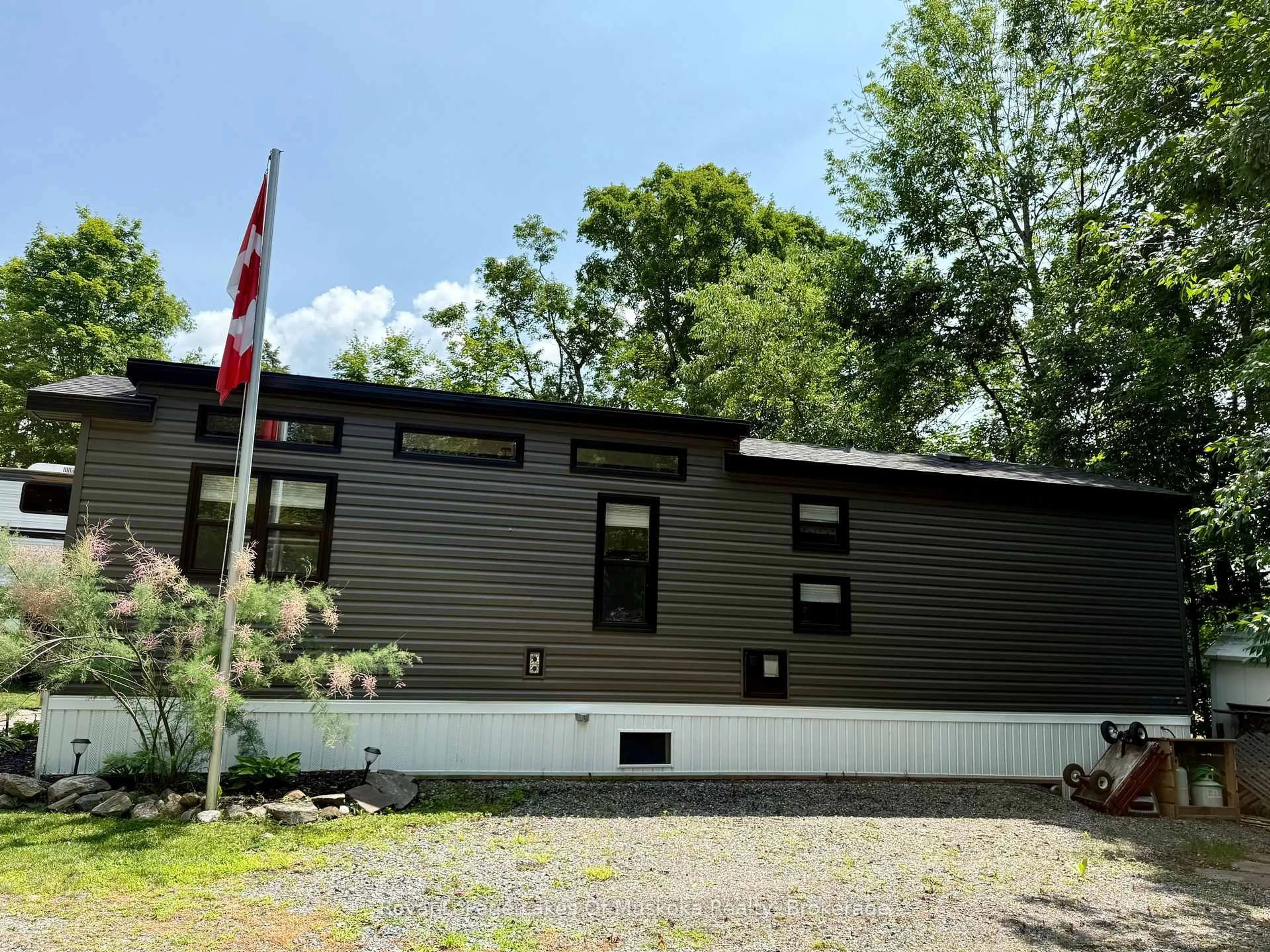 Home with vinyl exterior material, unknown for 1005 Stephens Bay Rd #Lot 41, Bracebridge Ontario P1L 1X2