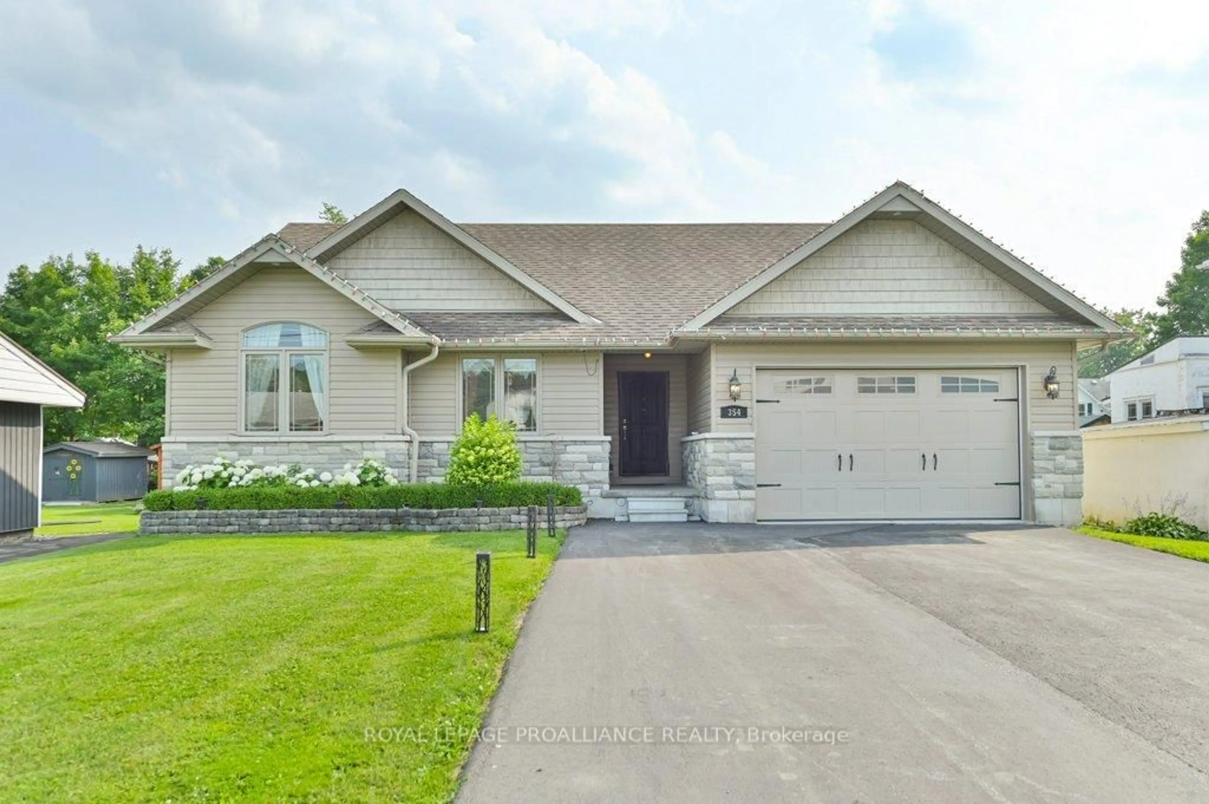 Home with vinyl exterior material, street for 354 ST JOSEPH St, Tweed Ontario K0K 3J0