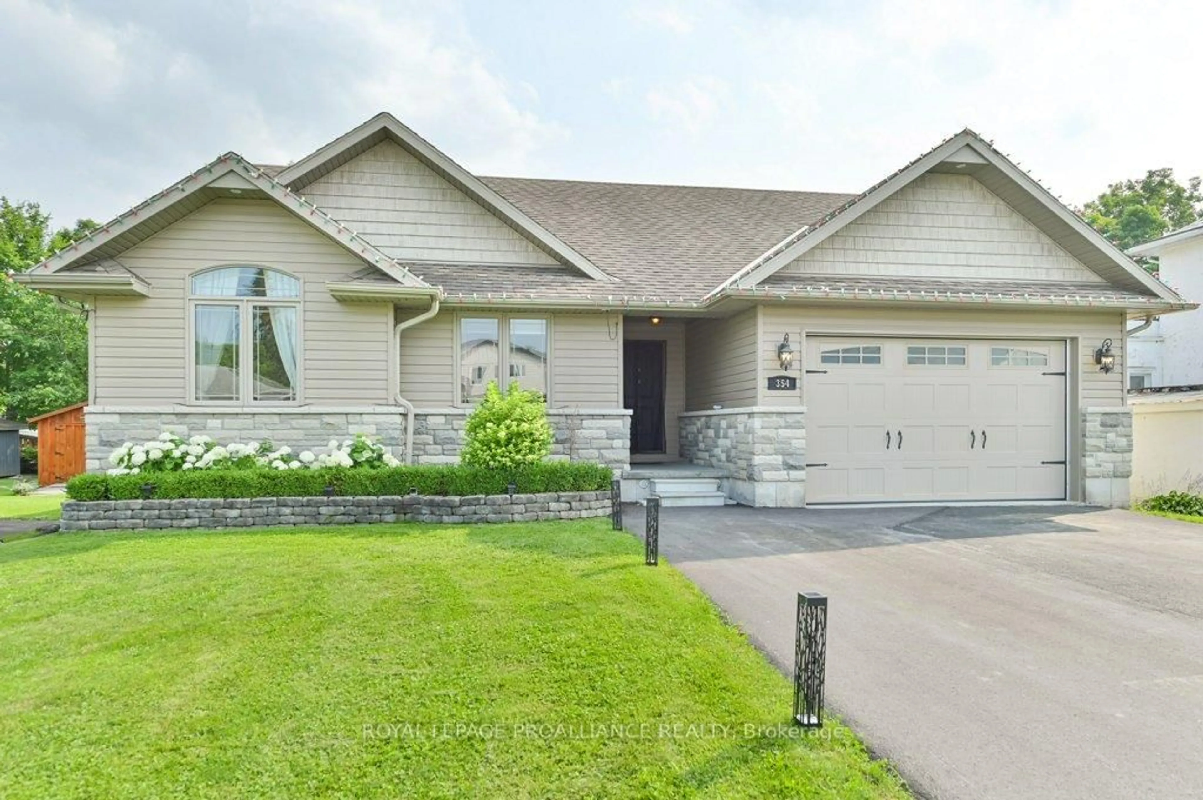 Home with vinyl exterior material, street for 354 ST JOSEPH St, Tweed Ontario K0K 3J0