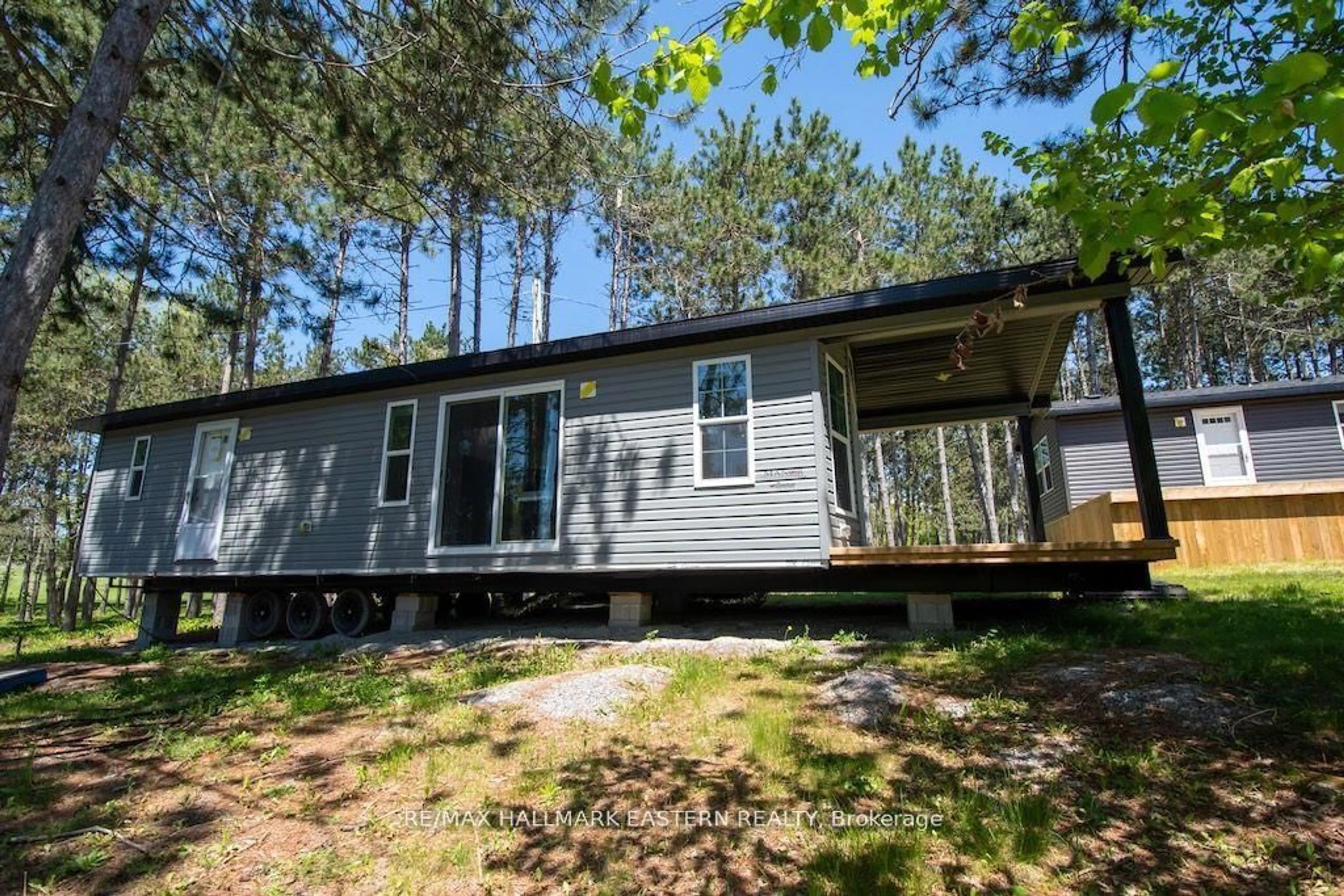 Home with vinyl exterior material, forest/trees view for 52 Fire Route 39 #Lot 205, Trent Lakes Ontario K0L 1J0