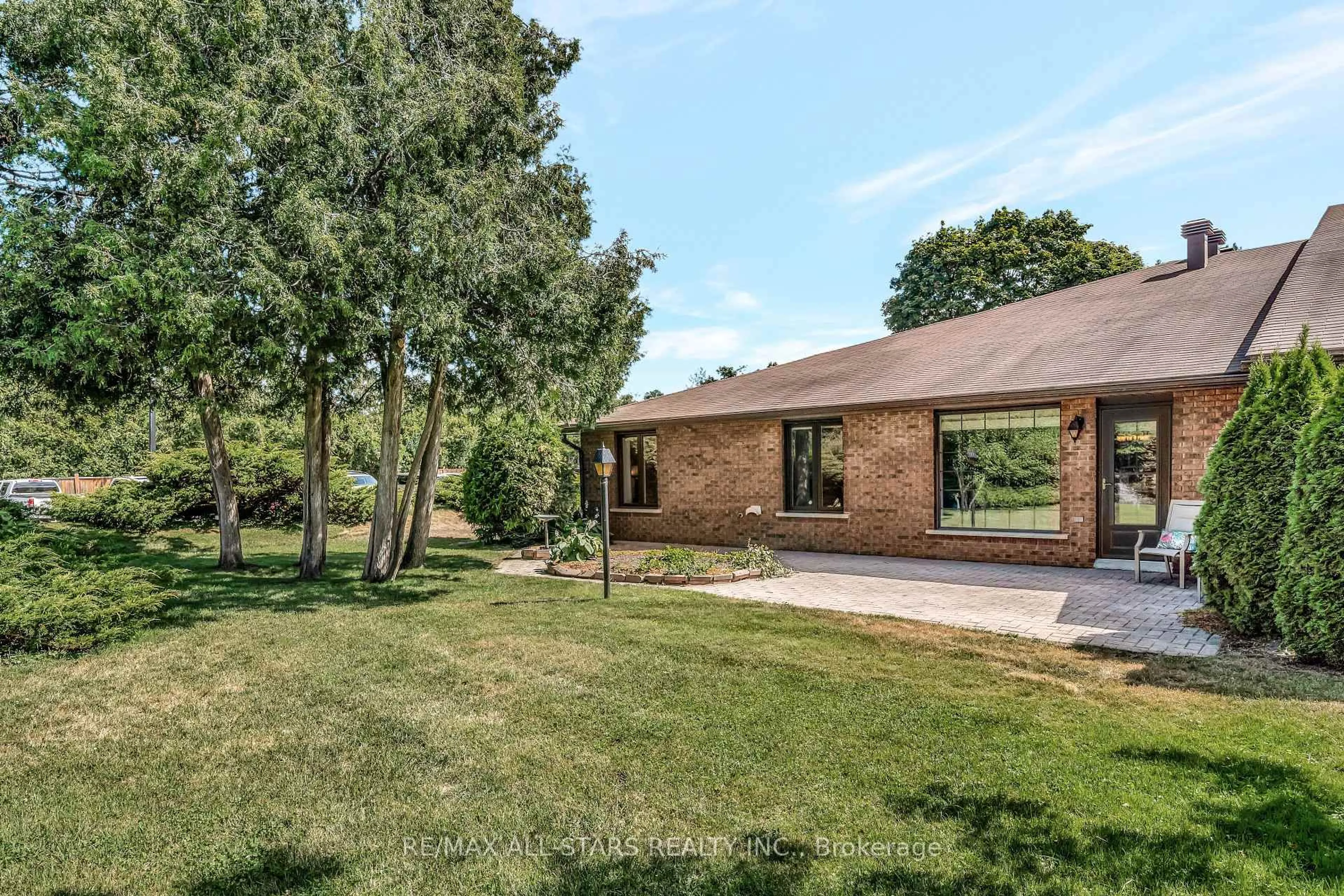 A pic from outside/outdoor area/front of a property/back of a property/a pic from drone, unknown for 200 East St #101, Kawartha Lakes Ontario K0M 1A0