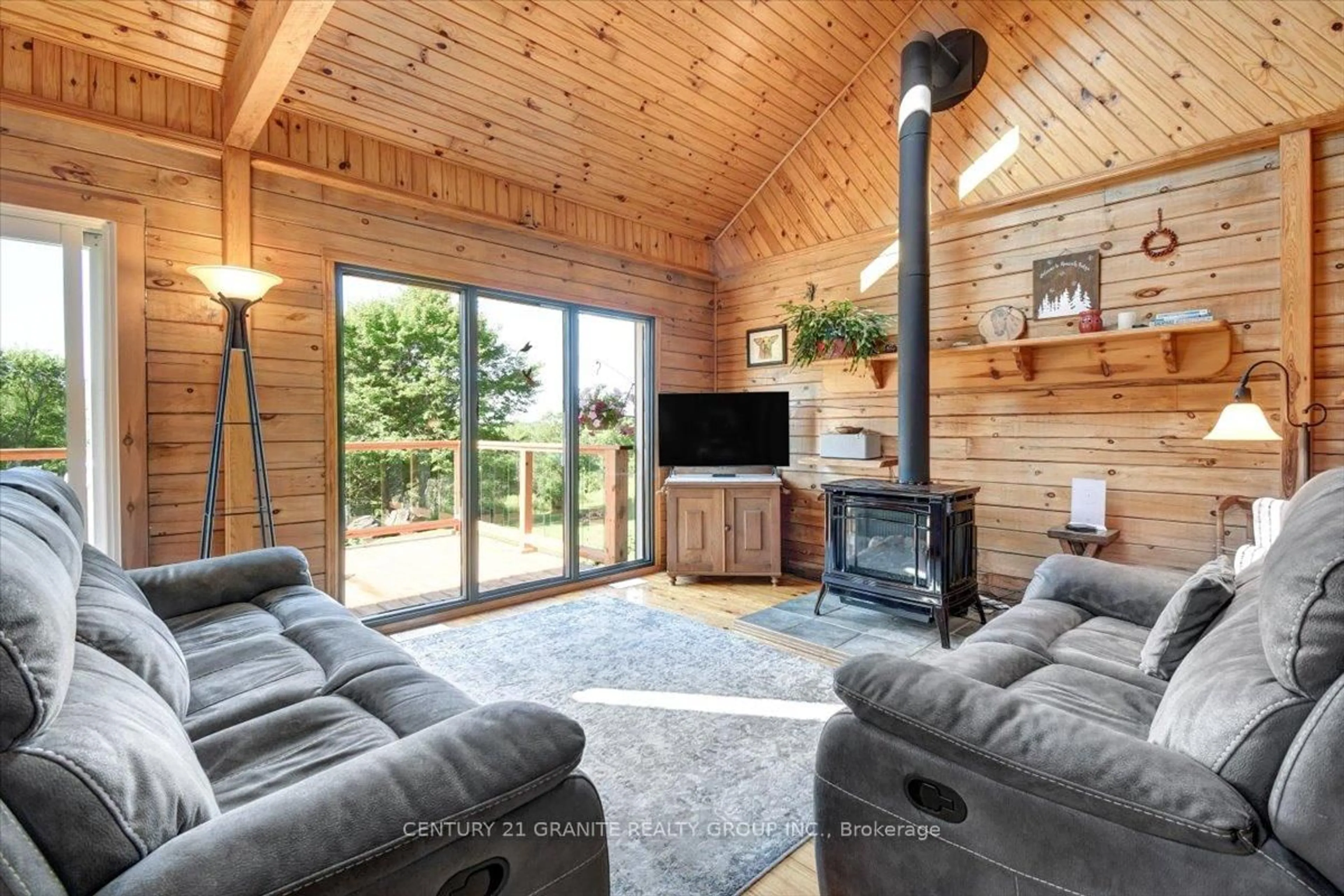 Living room with furniture, wood/laminate floor for 842 Upper Turriff Rd, Bancroft Ontario K0L 1C0