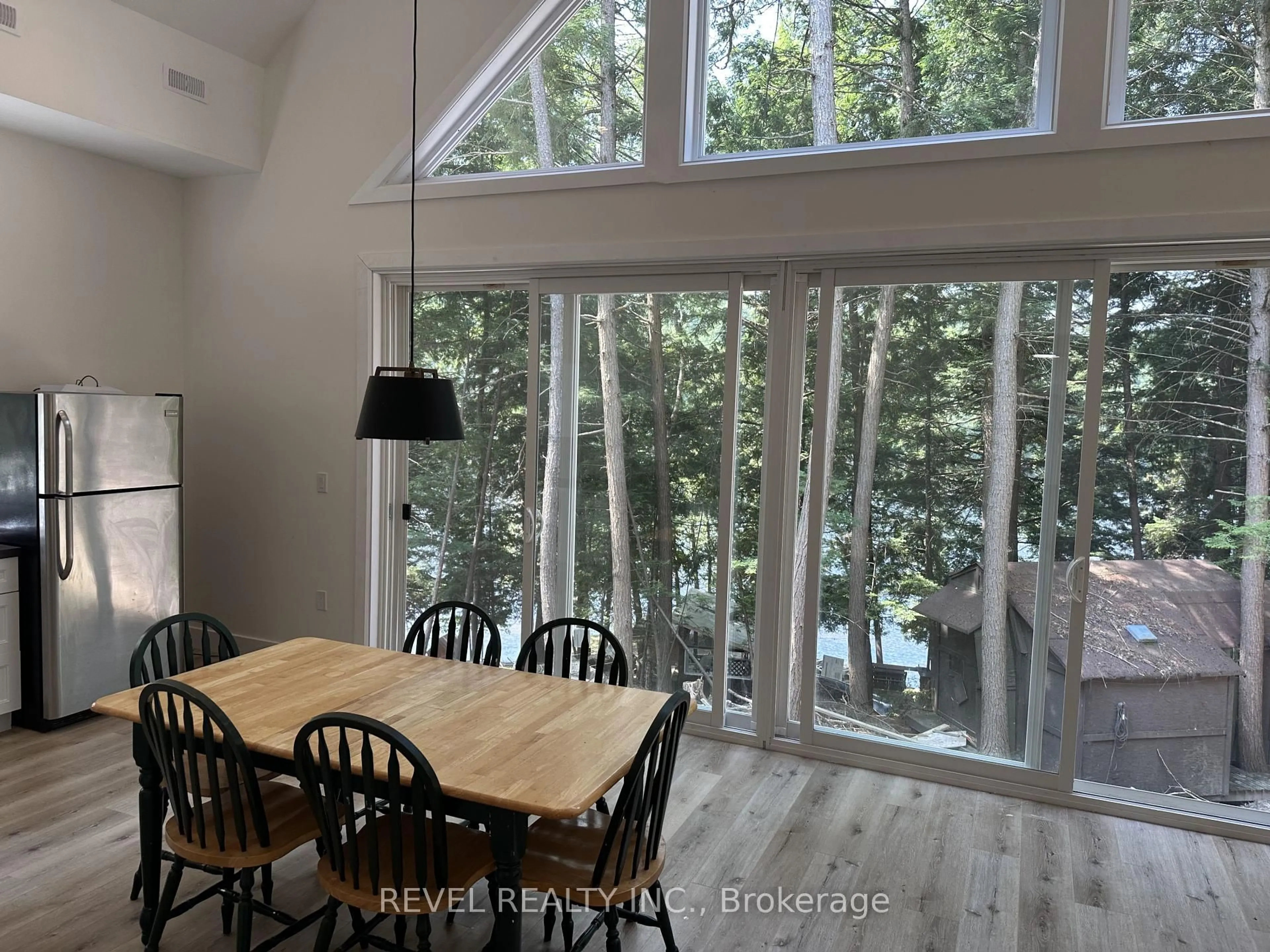 Dining room, wood/laminate floor for 132 Ivy Lane, Magnetawan Ontario P0A 1P0