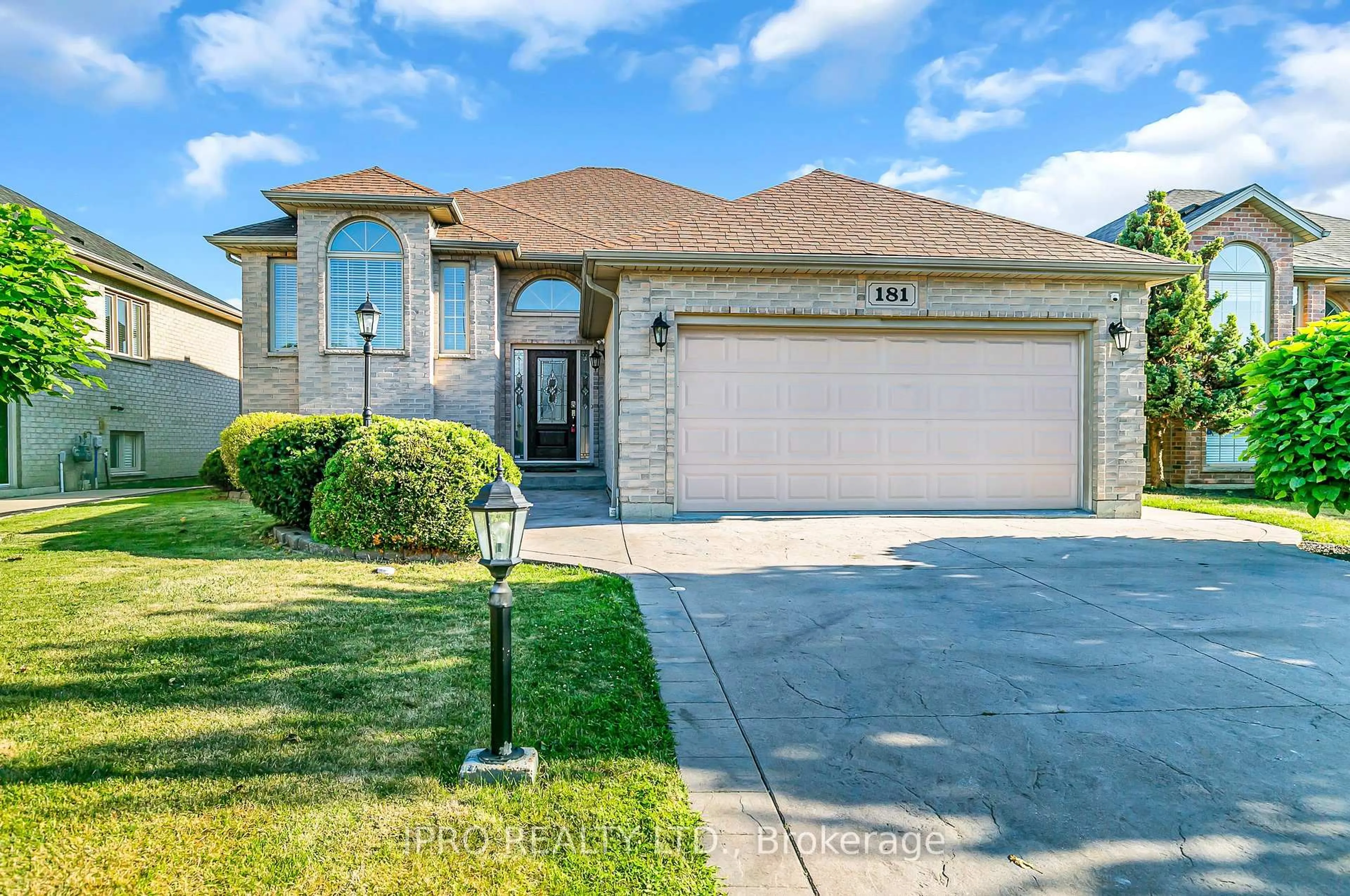 Home with brick exterior material, street for 181 Rockhaven Dr, Lakeshore Ontario N9K 1E9