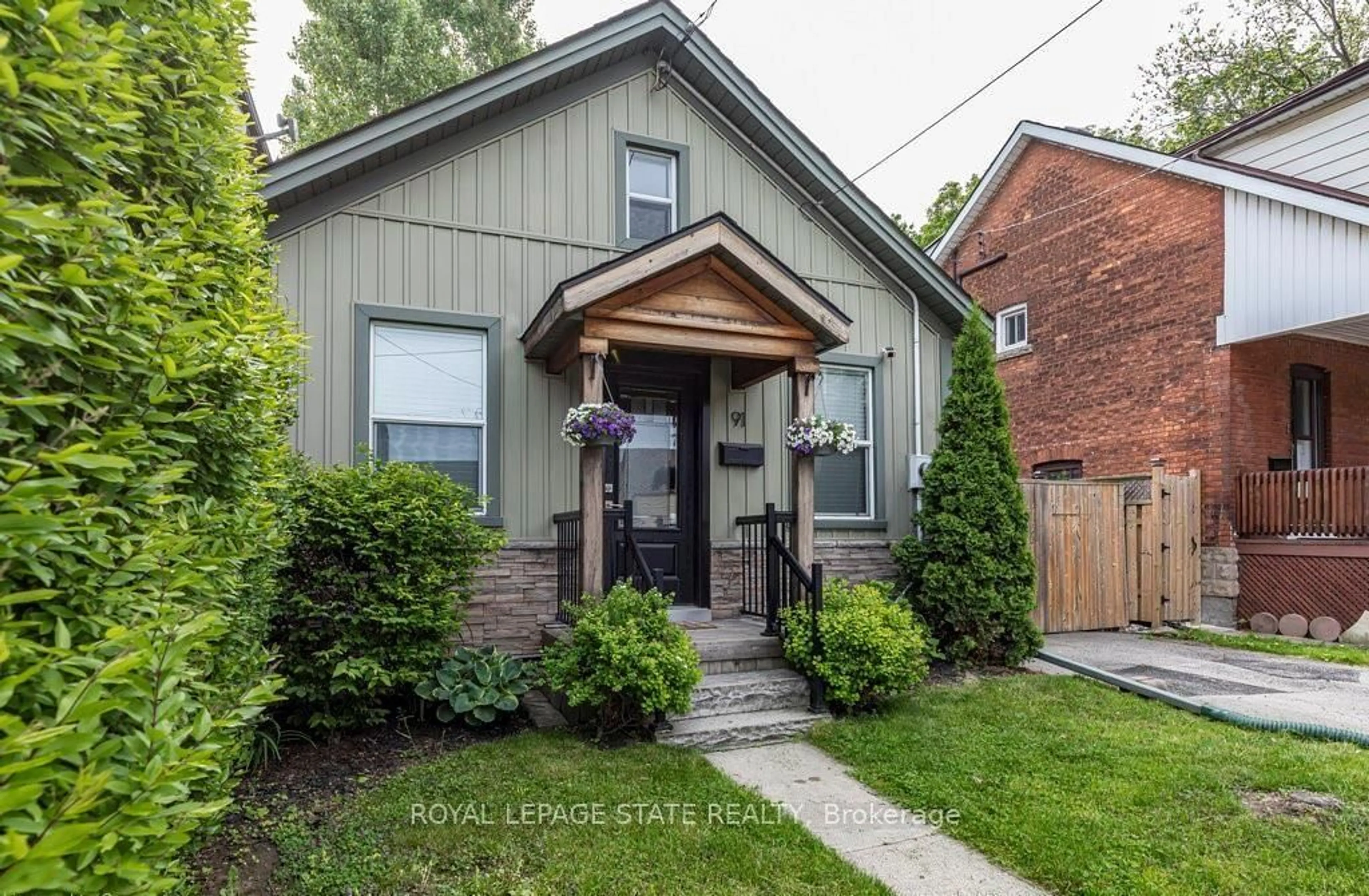 Home with brick exterior material, street for 91 Aurora St, Hamilton Ontario L8N 2P6