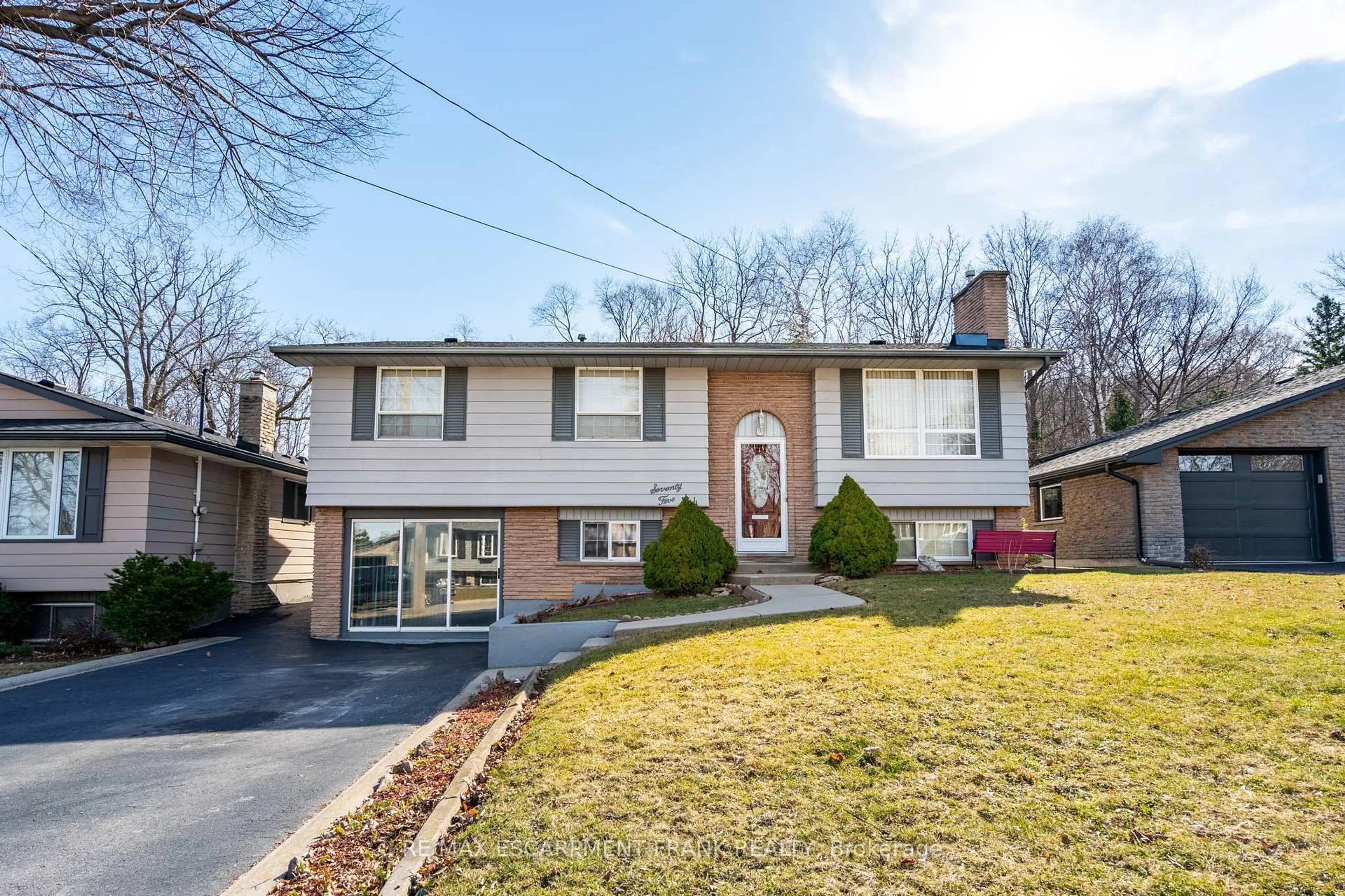 Home with brick exterior material, street for 75 Hanover Pl, Hamilton Ontario L8L 5X7