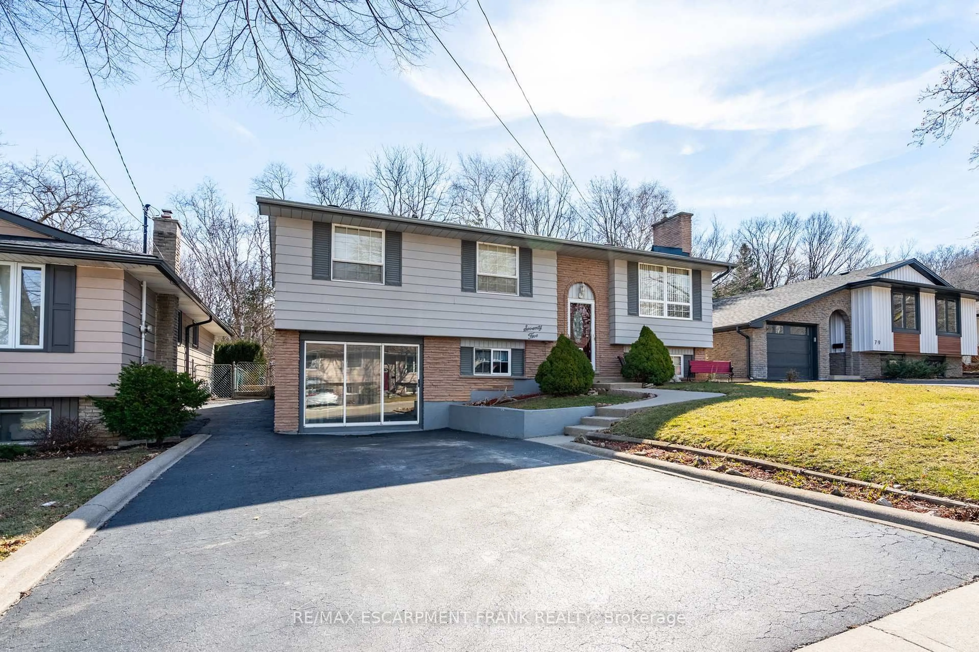 Home with brick exterior material, street for 75 Hanover Pl, Hamilton Ontario L8L 5X7