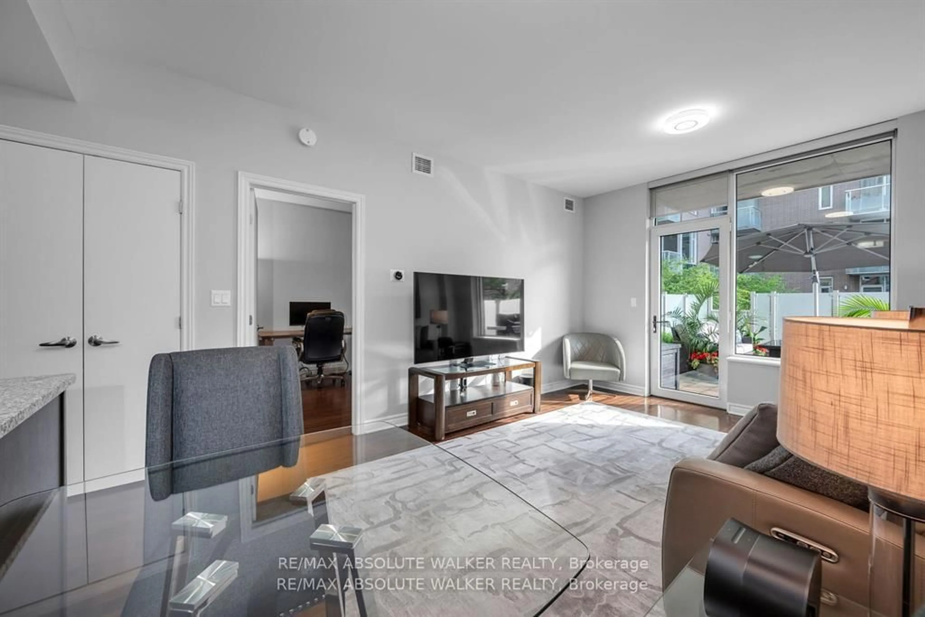 Living room with furniture, unknown for 575 Byron Ave #214, Ottawa Ontario K2A 1R7