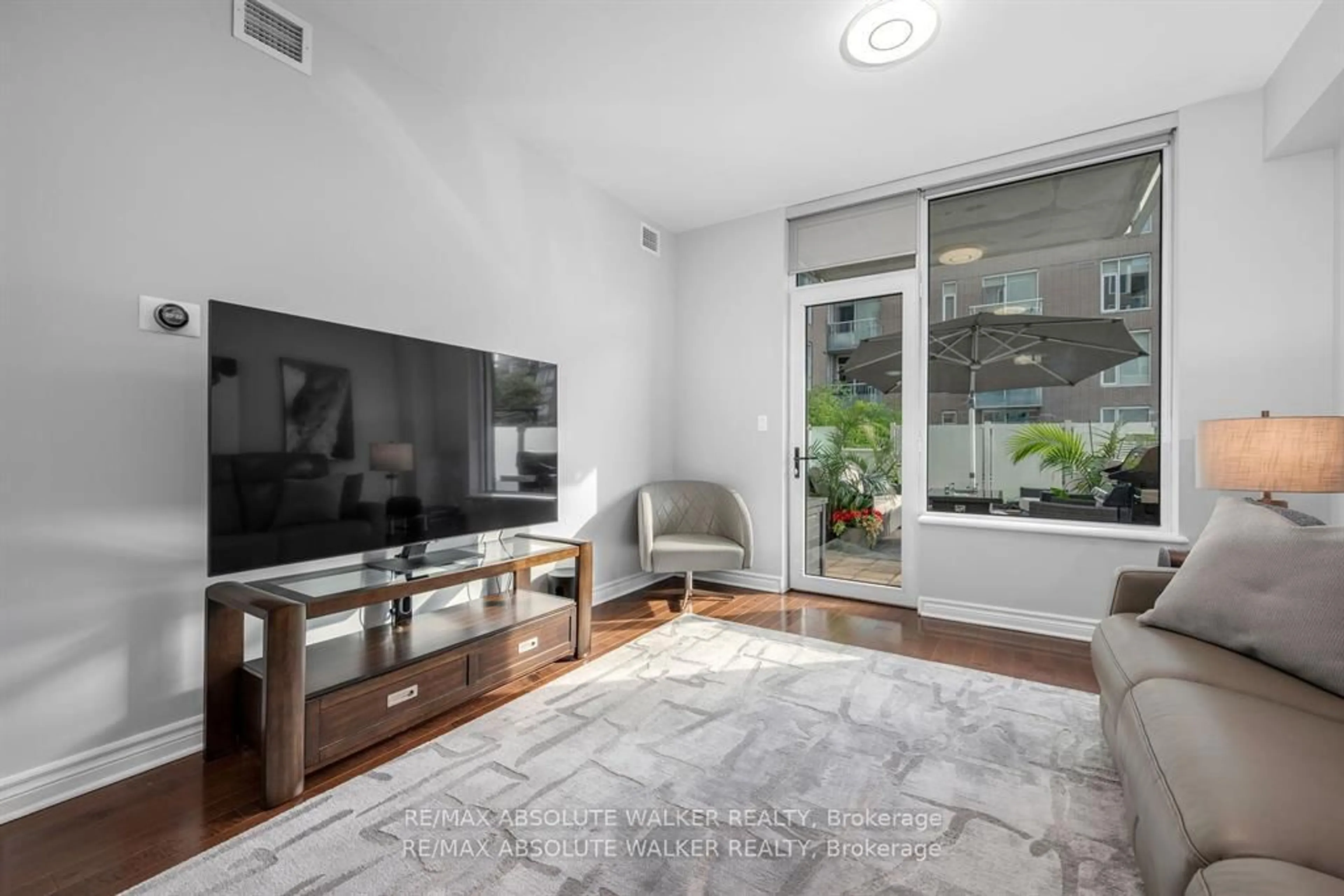 Living room with furniture, unknown for 575 Byron Ave #214, Ottawa Ontario K2A 1R7