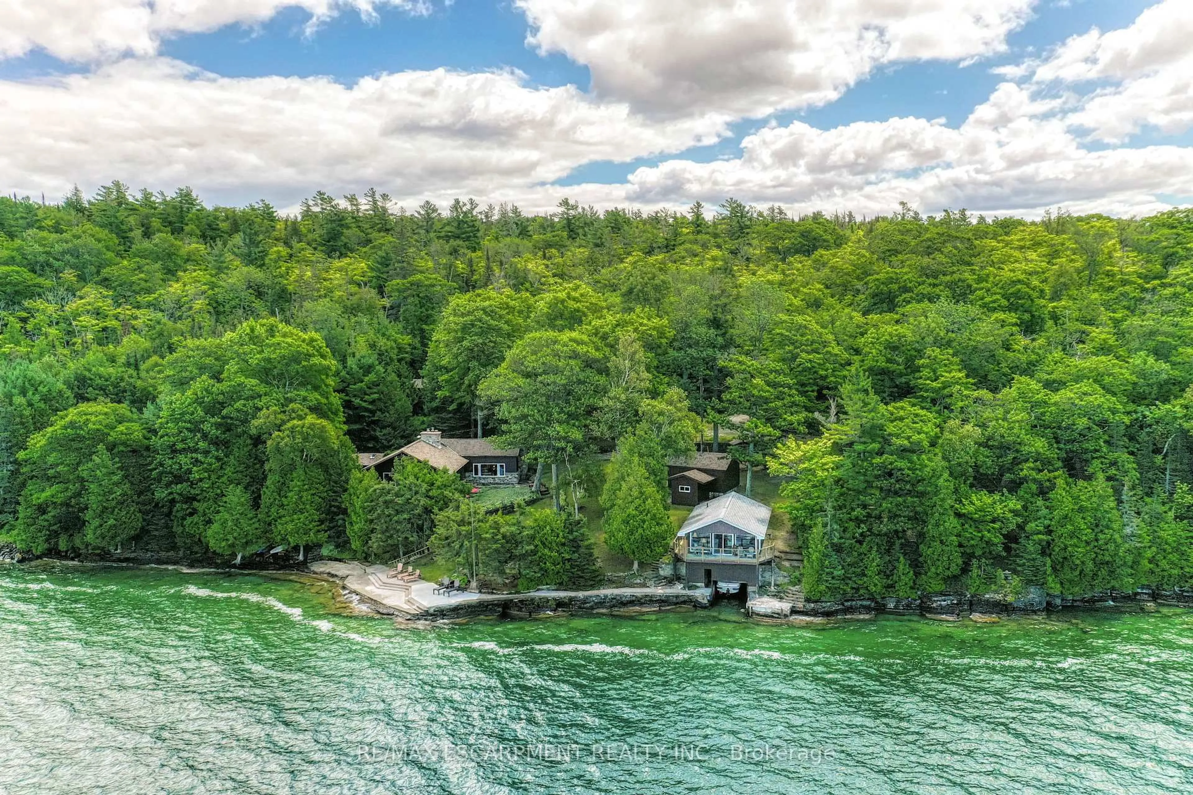 A pic from outside/outdoor area/front of a property/back of a property/a pic from drone, water/lake/river/ocean view for 199 Trillium Tr, Central Manitoulin Ontario P0P 2C0