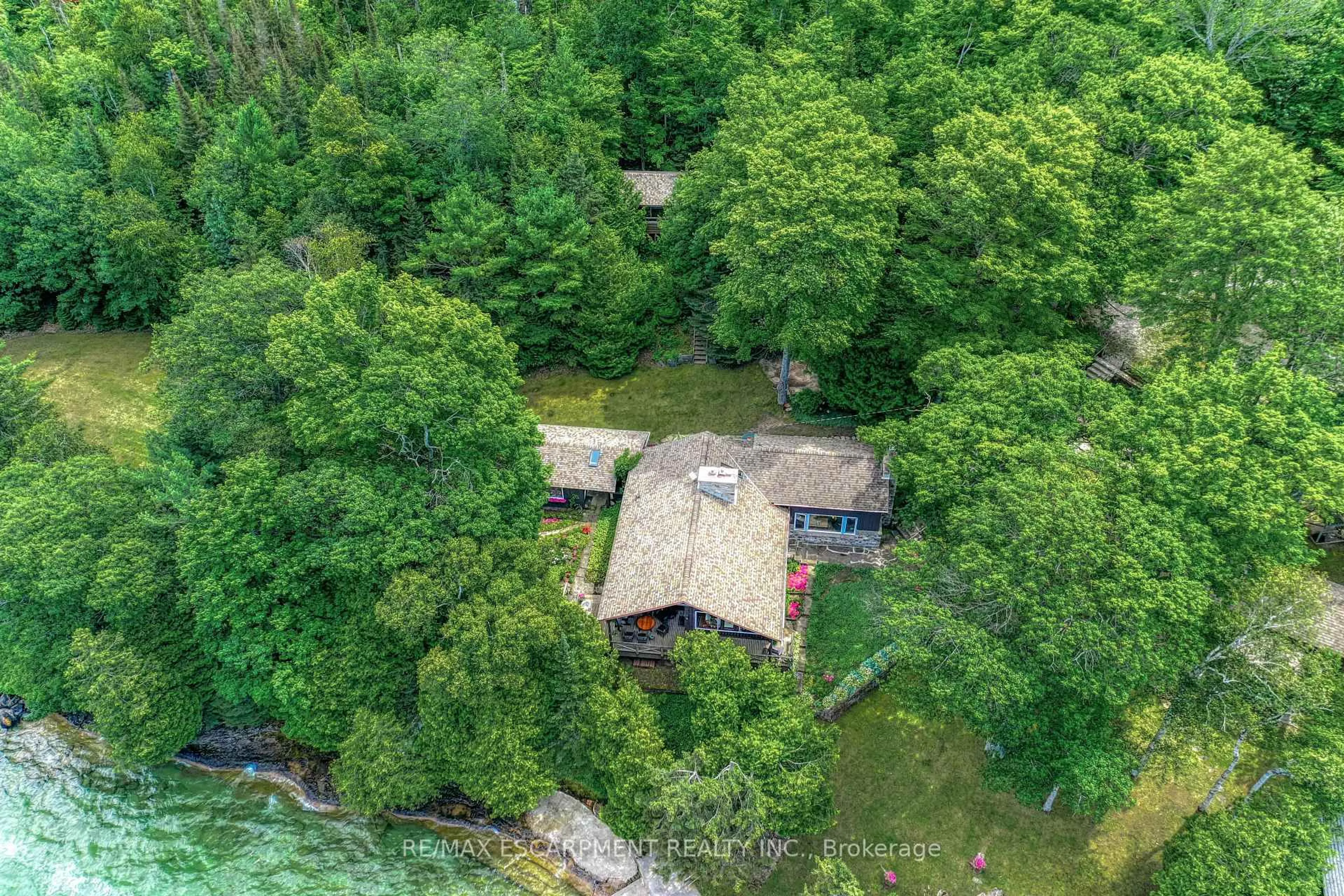 A pic from outside/outdoor area/front of a property/back of a property/a pic from drone, water/lake/river/ocean view for 199 Trillium Tr, Central Manitoulin Ontario P0P 2C0