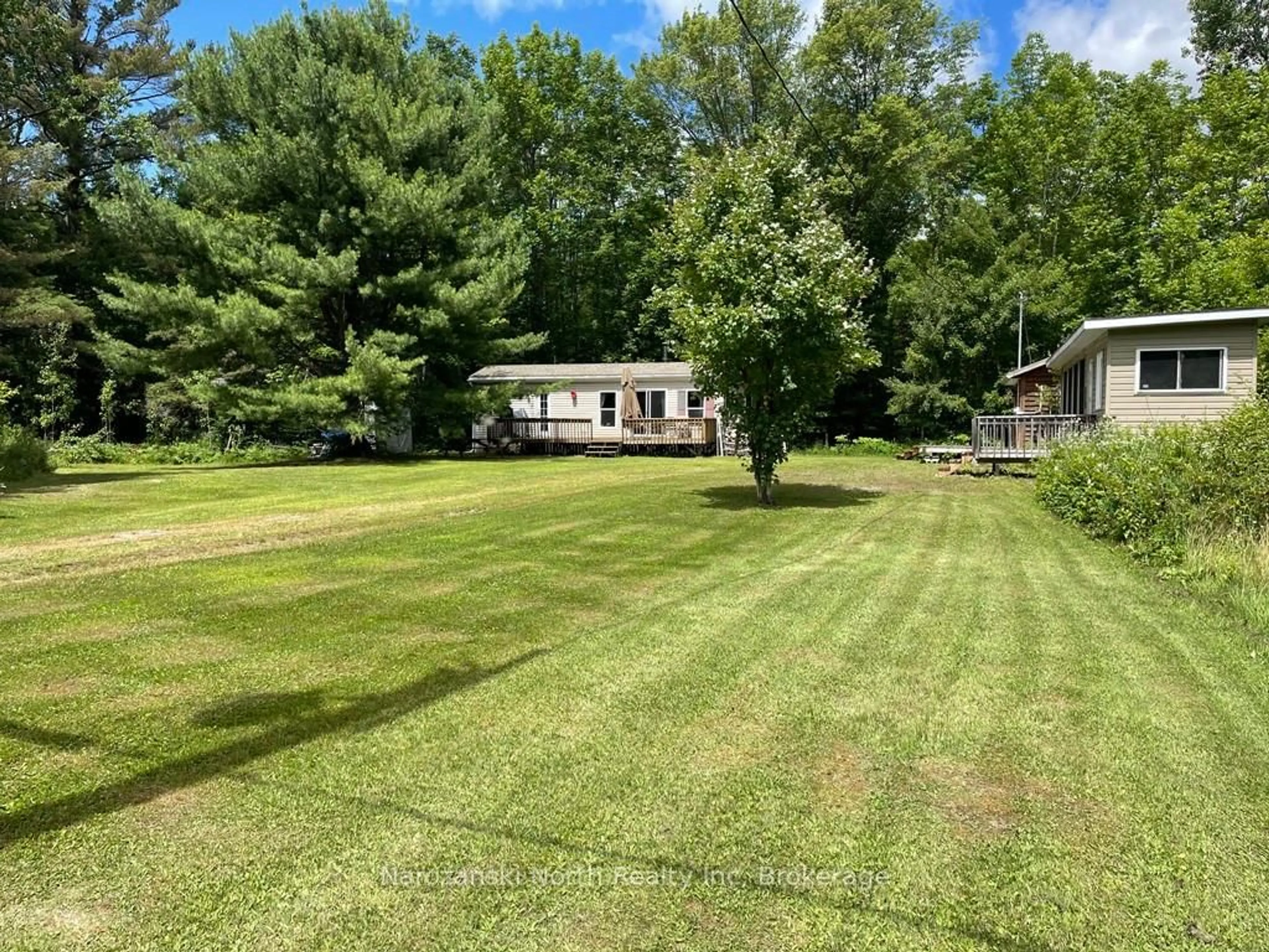 A pic from outside/outdoor area/front of a property/back of a property/a pic from drone, water/lake/river/ocean view for 2487 Wolseley Bay Rd, West Nipissing Ontario P0M 2N0