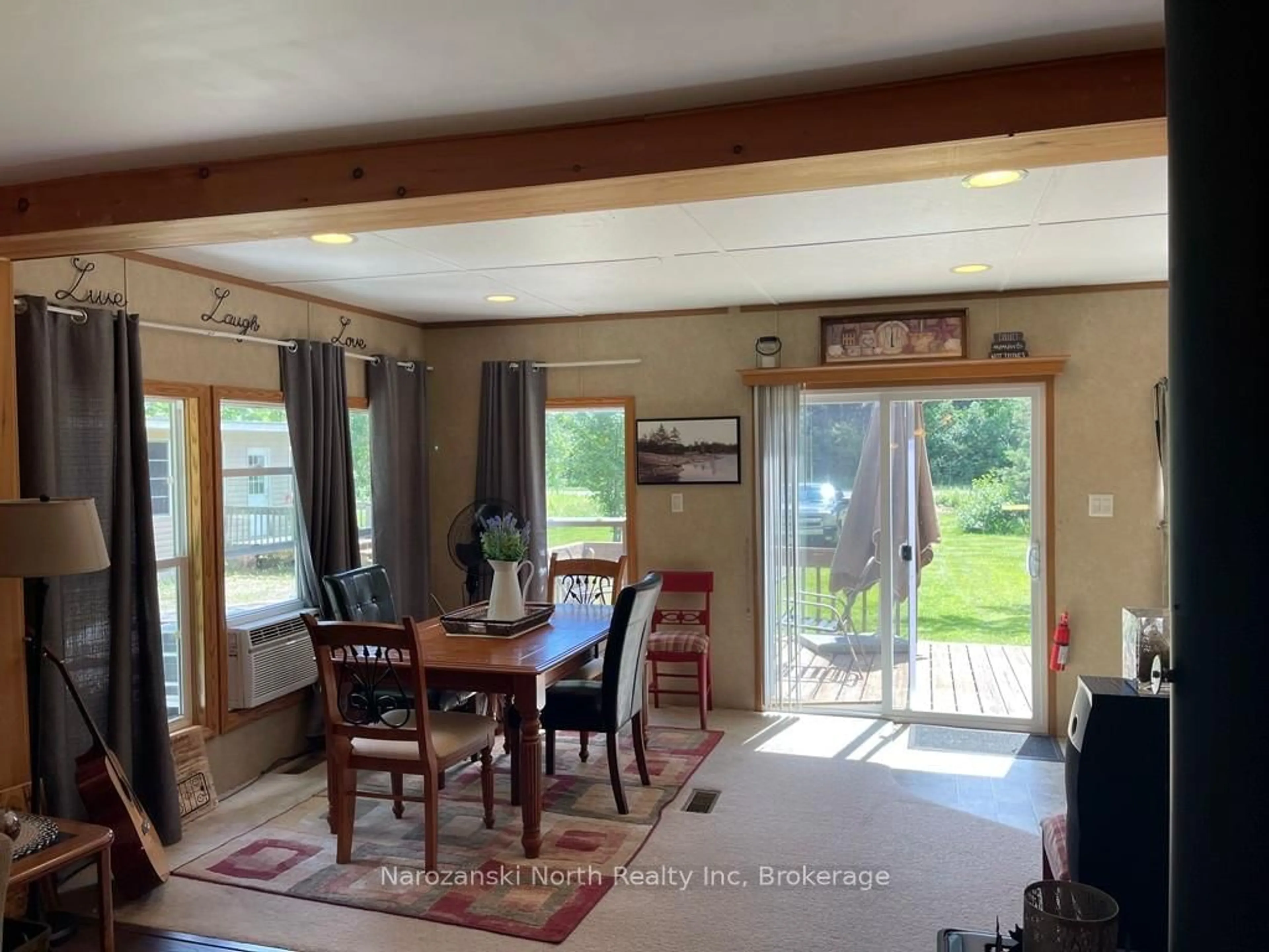 Dining room, wood/laminate floor for 2487 Wolseley Bay Rd, West Nipissing Ontario P0M 2N0
