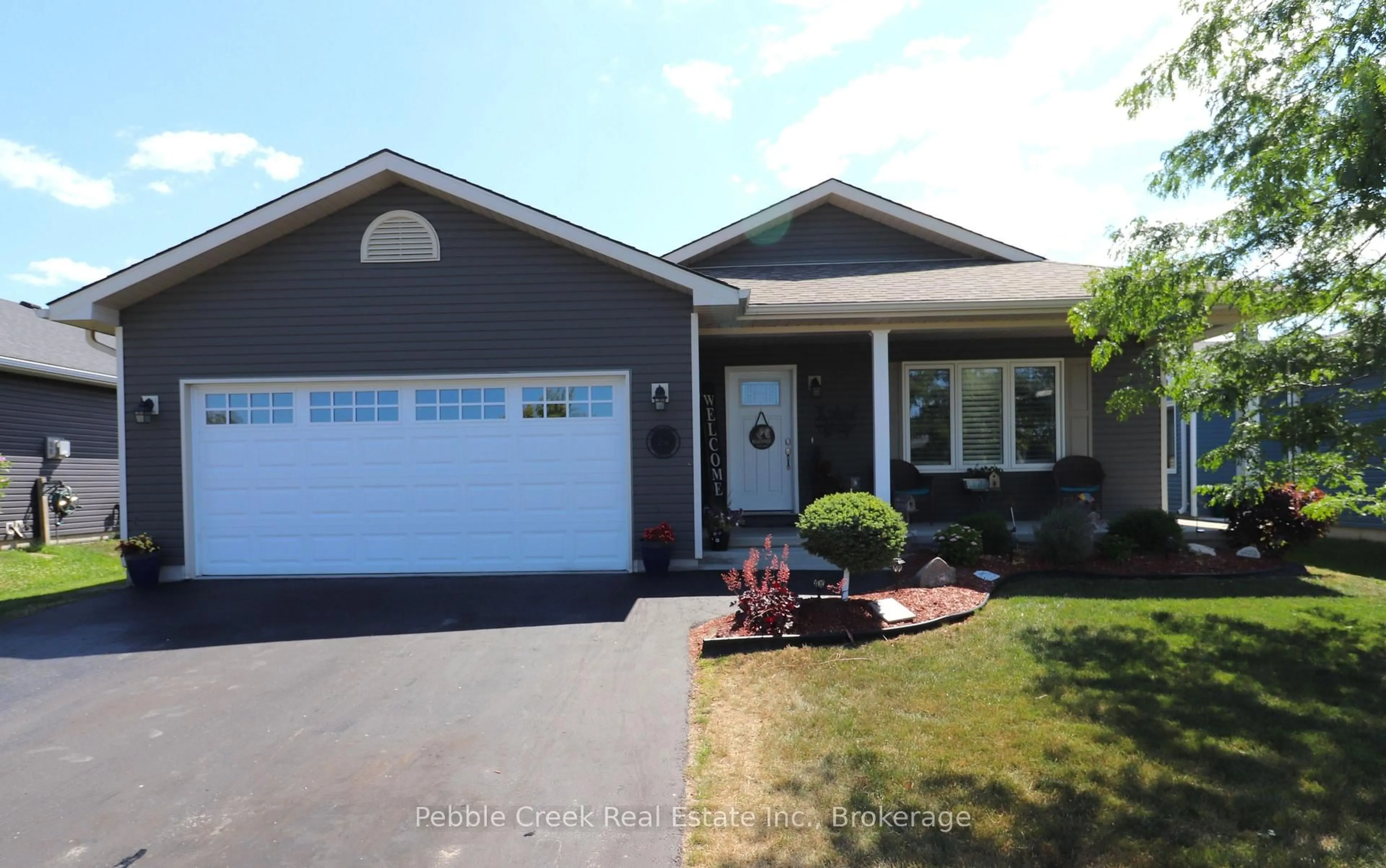 Home with vinyl exterior material, street for 24 Huron Heights Dr, Ashfield-Colborne-Wawanosh Ontario N7A 0B1