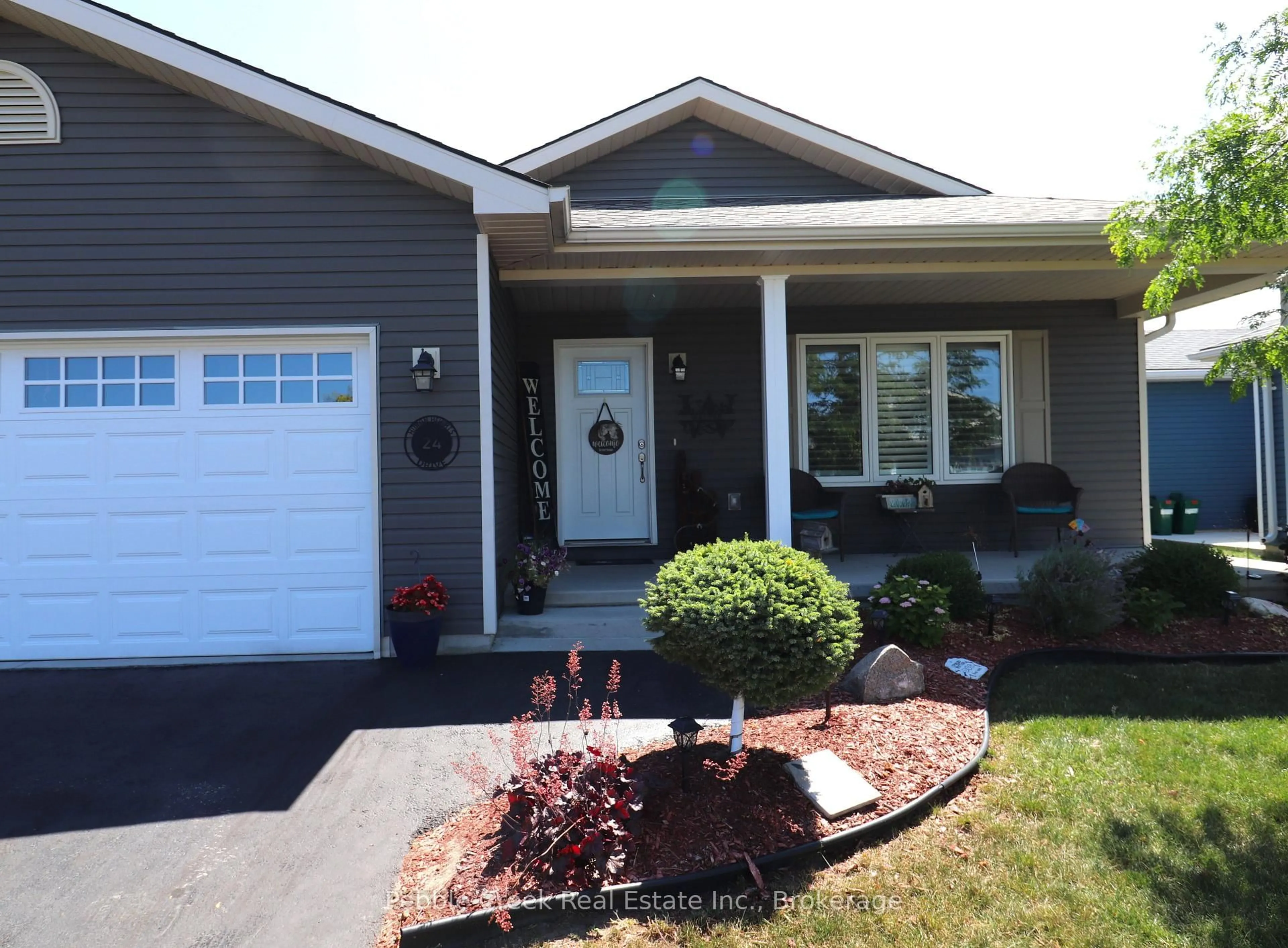 Home with vinyl exterior material, street for 24 Huron Heights Dr, Ashfield-Colborne-Wawanosh Ontario N7A 0B1