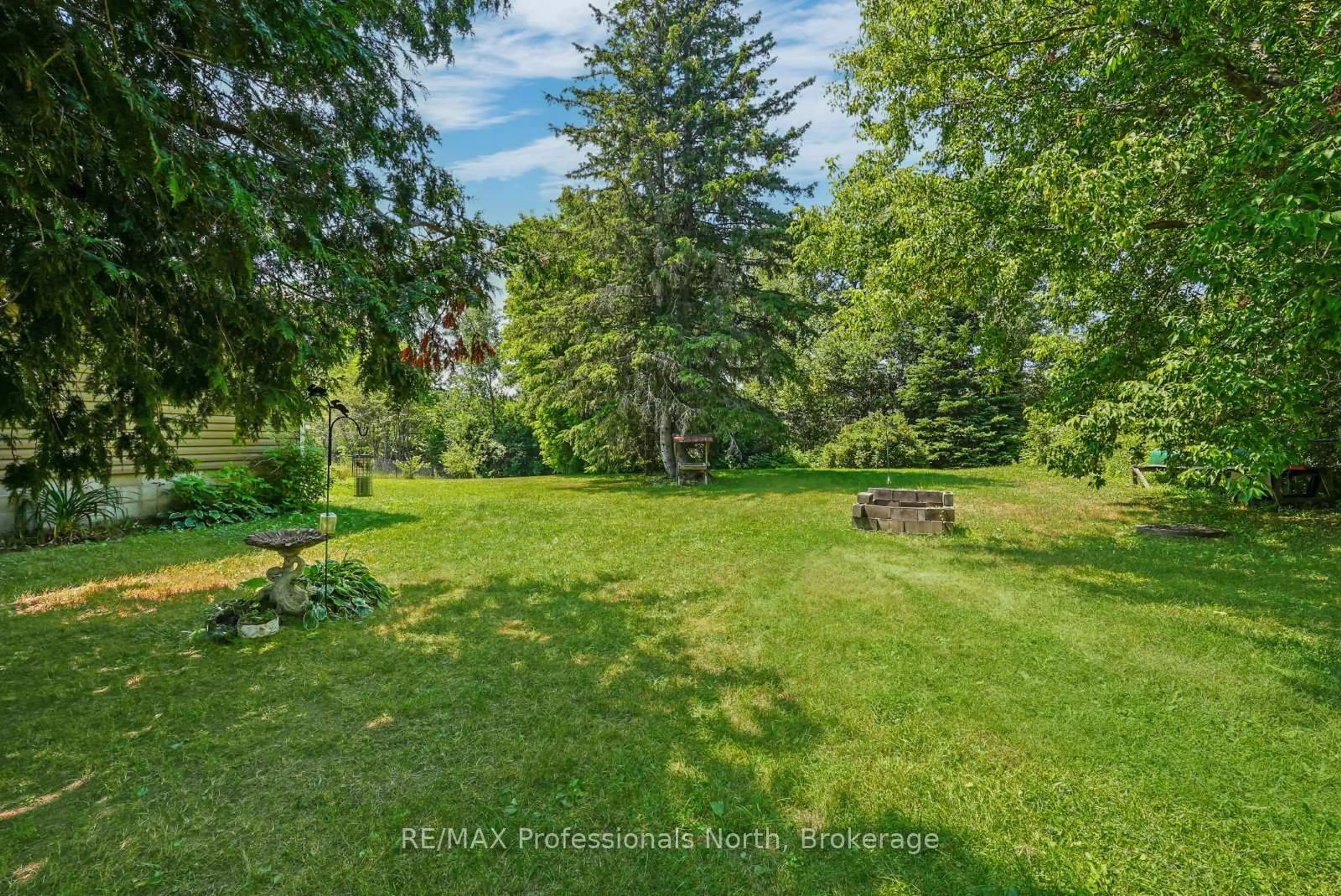 A pic from outside/outdoor area/front of a property/back of a property/a pic from drone, forest/trees view for 2279 Loop Rd, Highlands East Ontario K0L 3C0