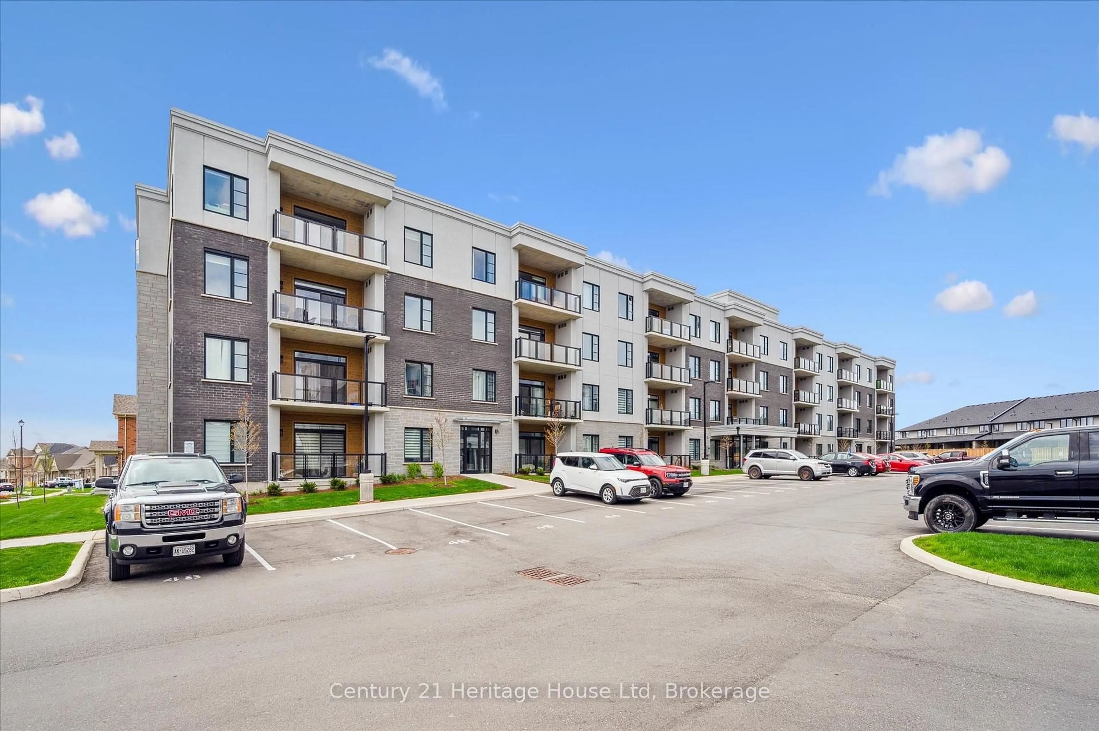 A pic from outside/outdoor area/front of a property/back of a property/a pic from drone, street for 99B Farley Rd #212, Centre Wellington Ontario N1M 0J9