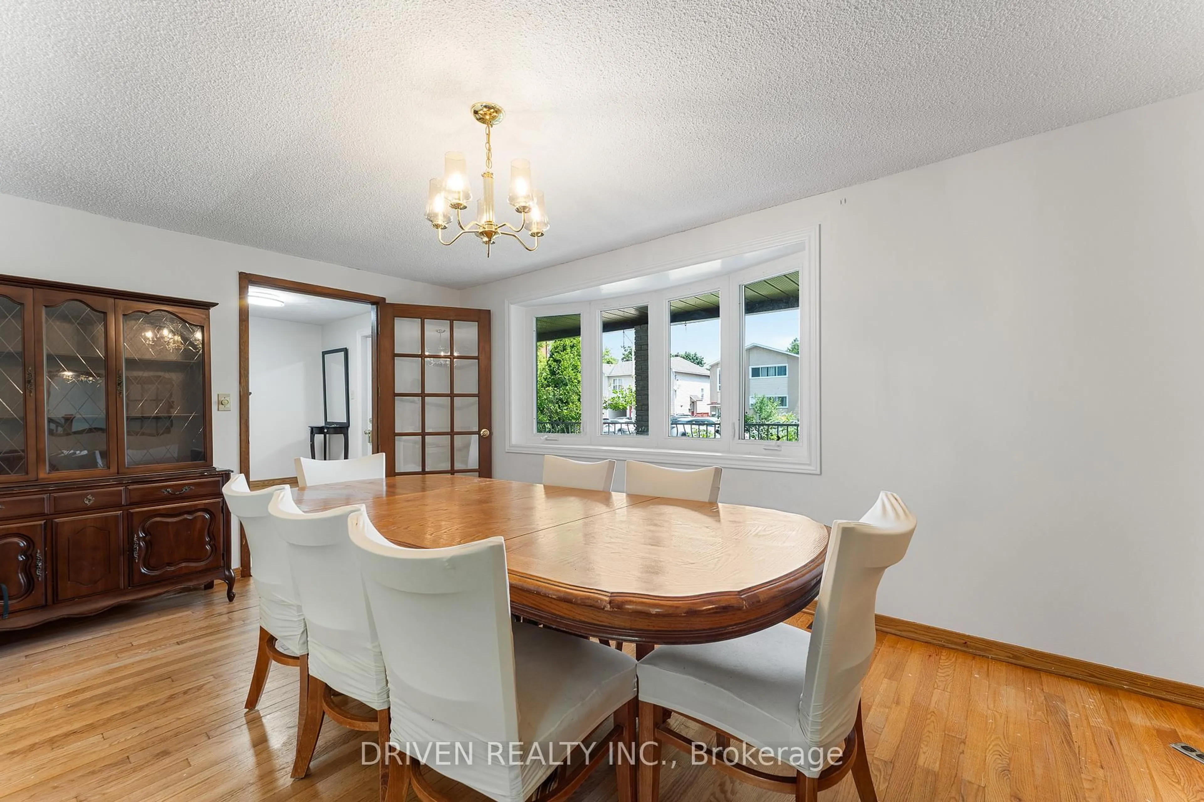 Dining room, wood/laminate floor for 876 Pinecrest Rd, Ottawa Ontario K2B 6B2