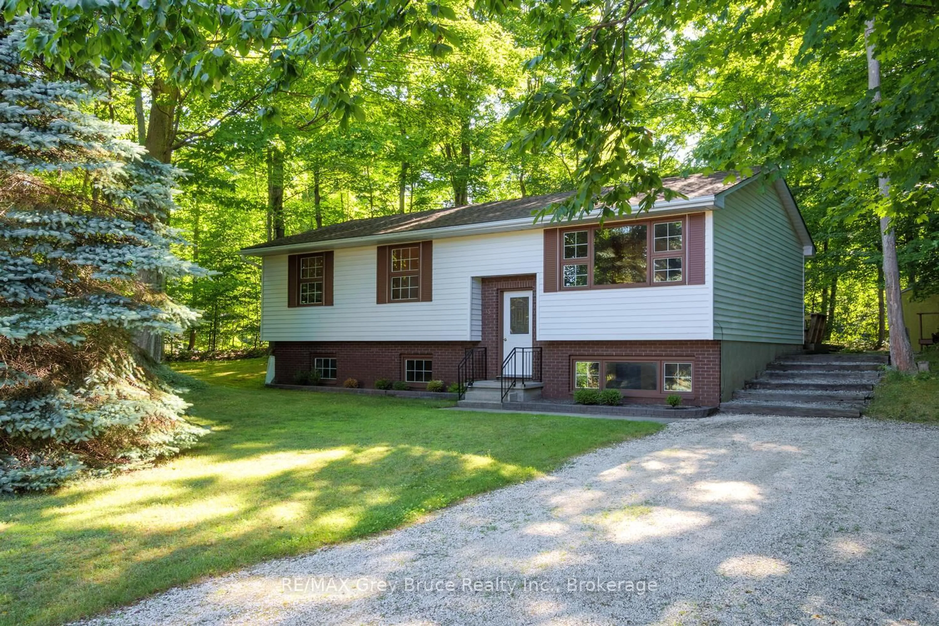 Home with vinyl exterior material, street for 5 Carson Lake Cres, South Bruce Peninsula Ontario N0H 2G0