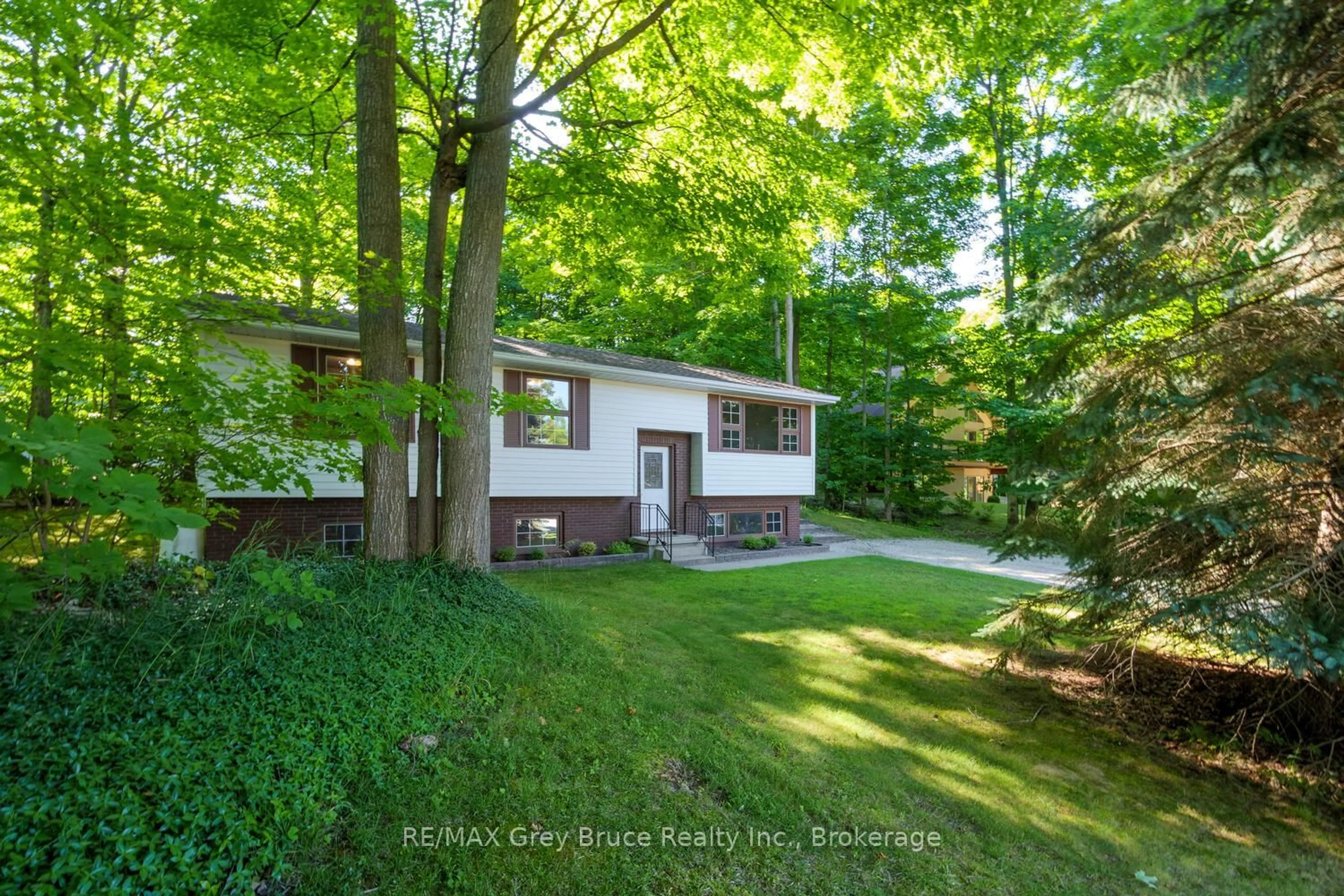 A pic from outside/outdoor area/front of a property/back of a property/a pic from drone, forest/trees view for 5 Carson Lake Cres, South Bruce Peninsula Ontario N0H 2G0
