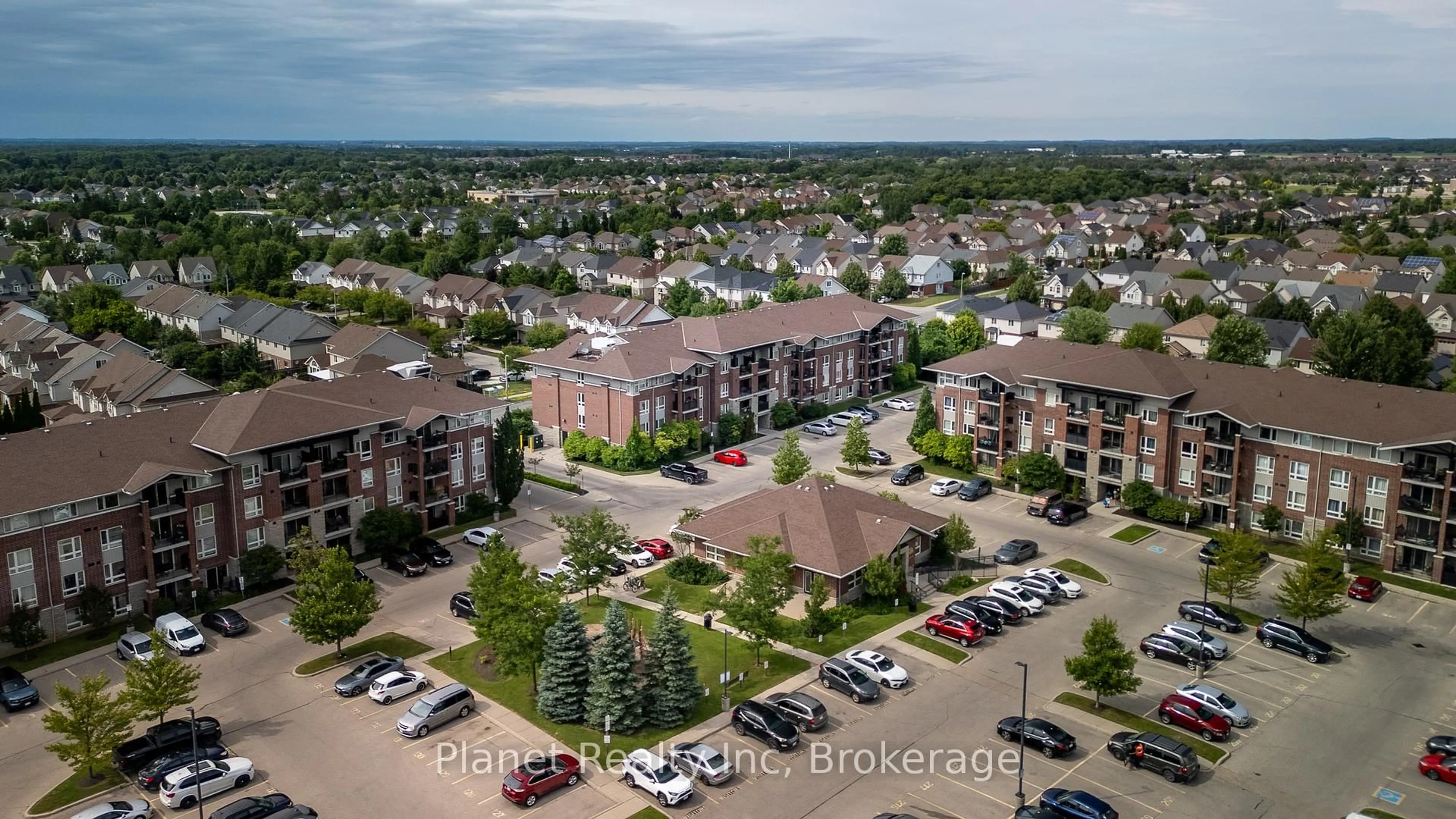A pic from outside/outdoor area/front of a property/back of a property/a pic from drone, unknown for 39 Goodwin Dr #110, Guelph Ontario N1L 0E5