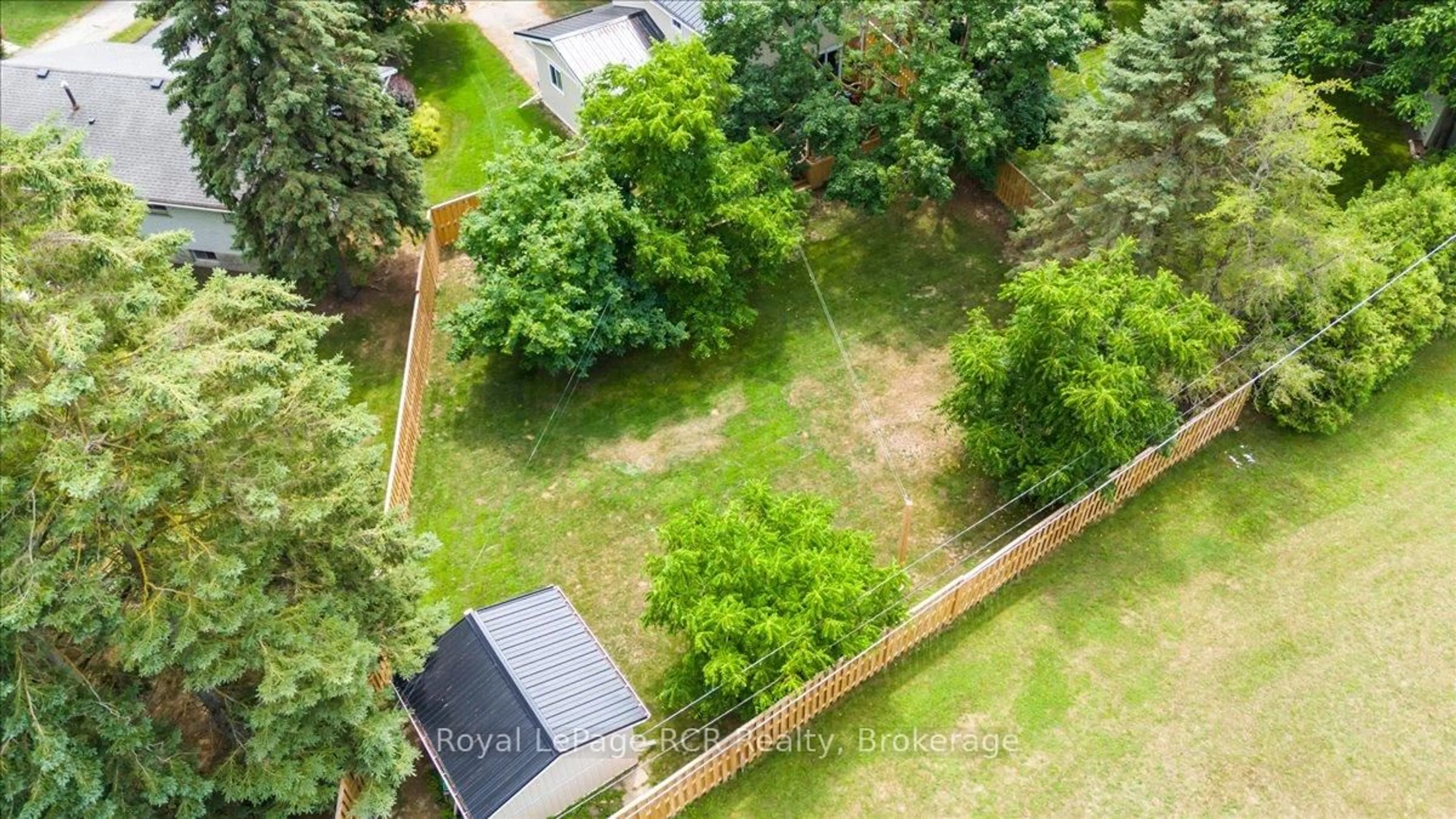 A pic from outside/outdoor area/front of a property/back of a property/a pic from drone, forest/trees view for 640 13th St, Hanover Ontario N4N 1Y8