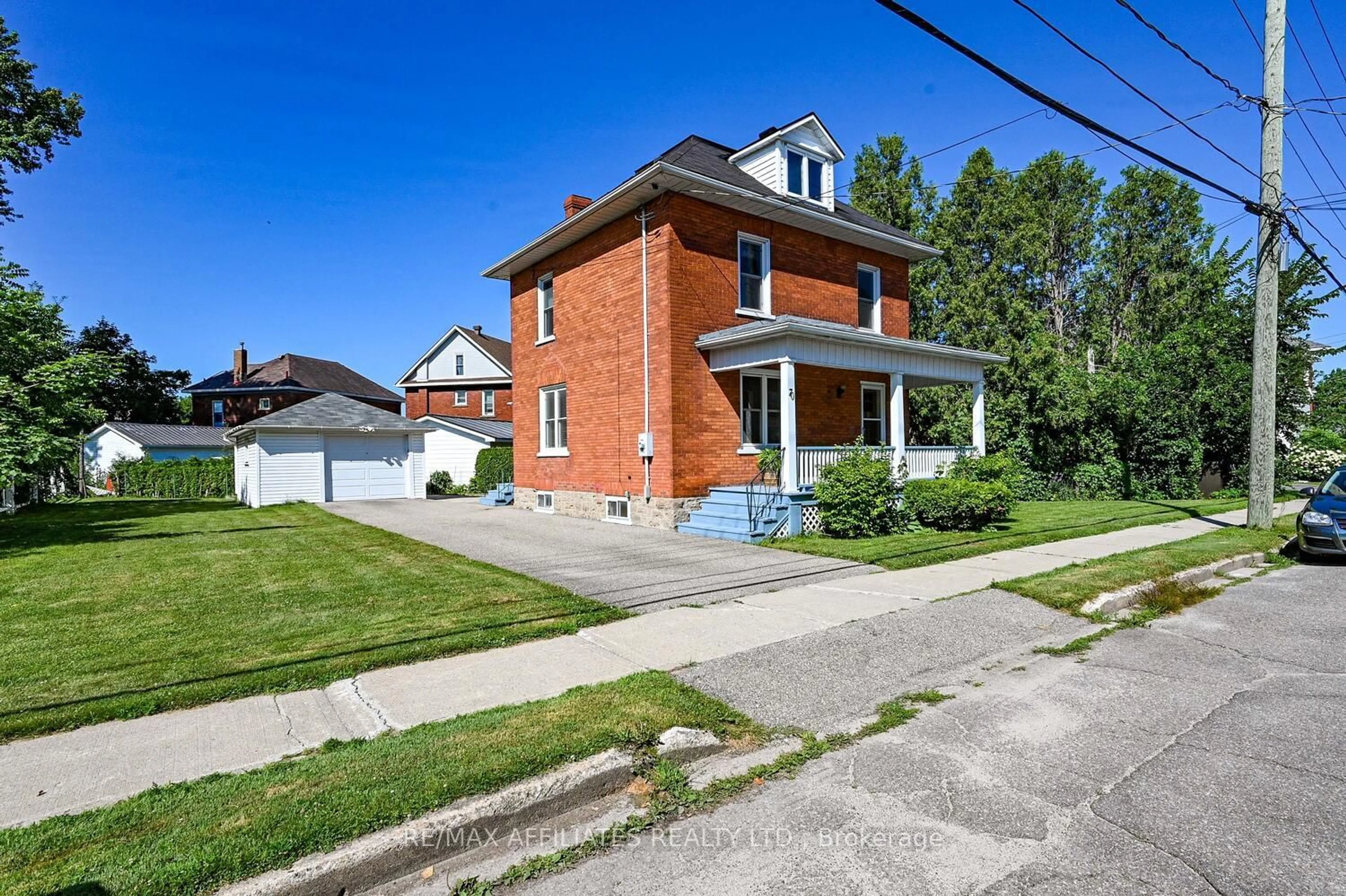 Home with brick exterior material, street for 70 McGill St, Smiths Falls Ontario K7A 2J9