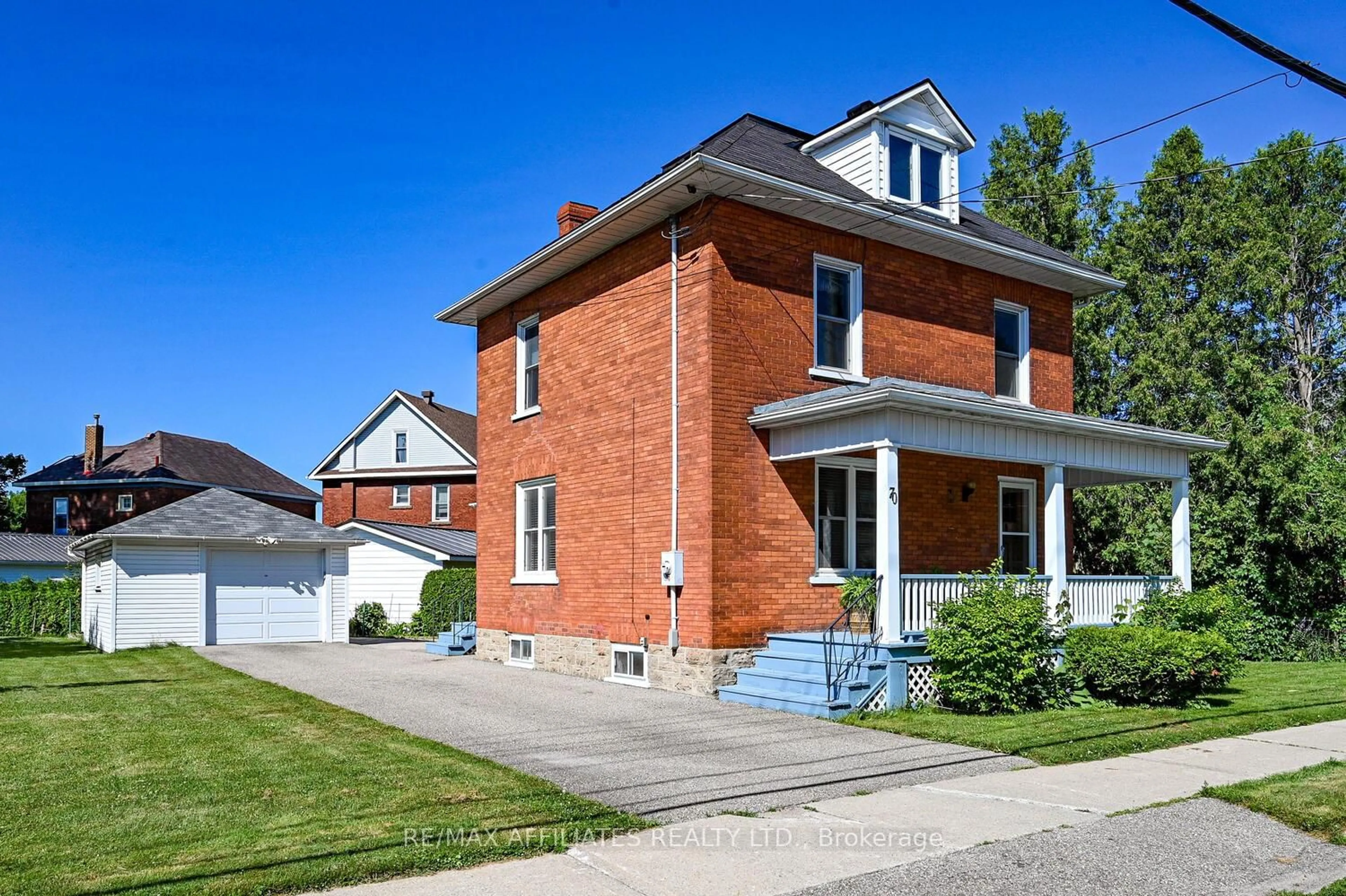 Home with brick exterior material, street for 70 McGill St, Smiths Falls Ontario K7A 2J9