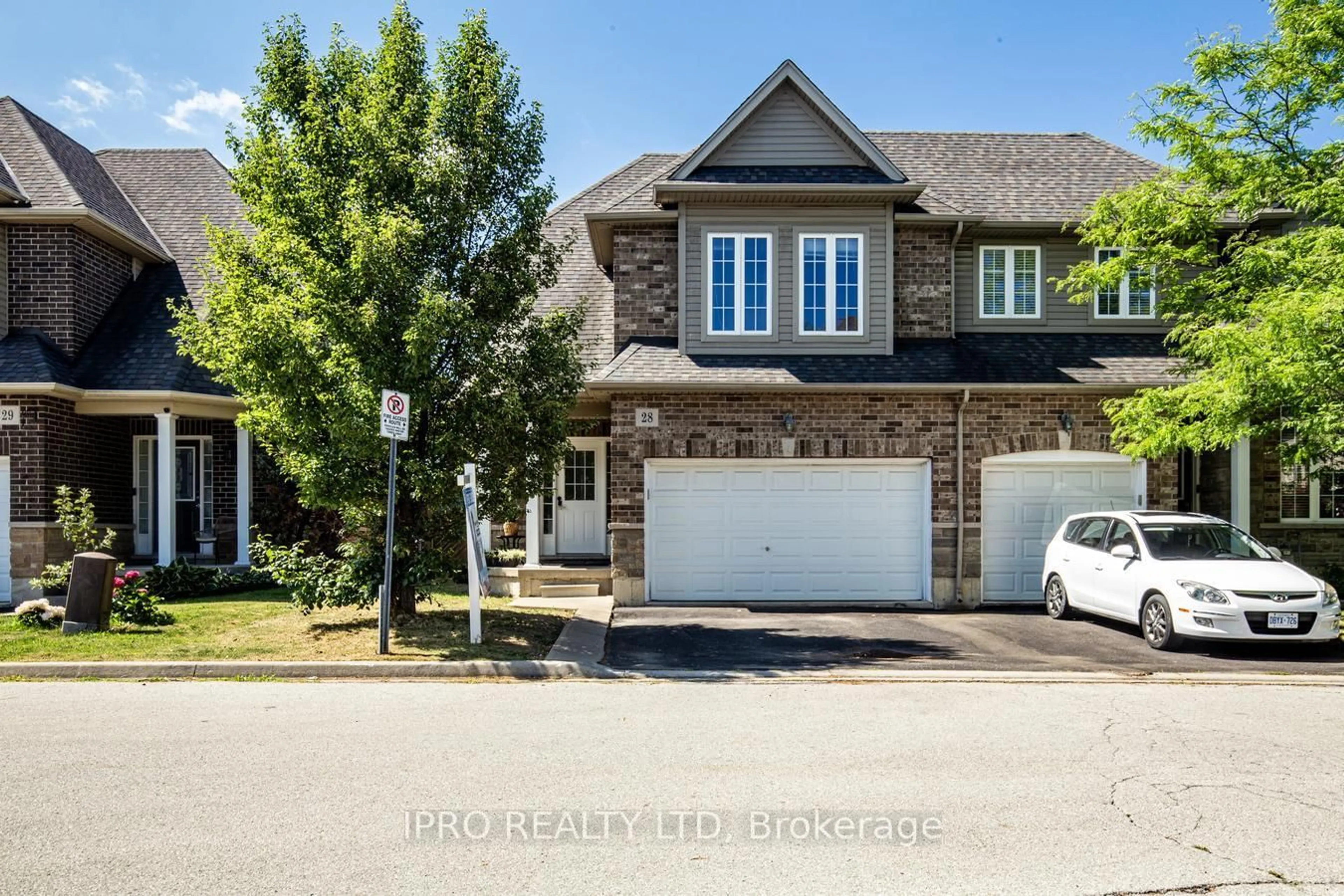 A pic from outside/outdoor area/front of a property/back of a property/a pic from drone, street for 6 Atessa Dr #28, Hamilton Ontario L9B 0C6